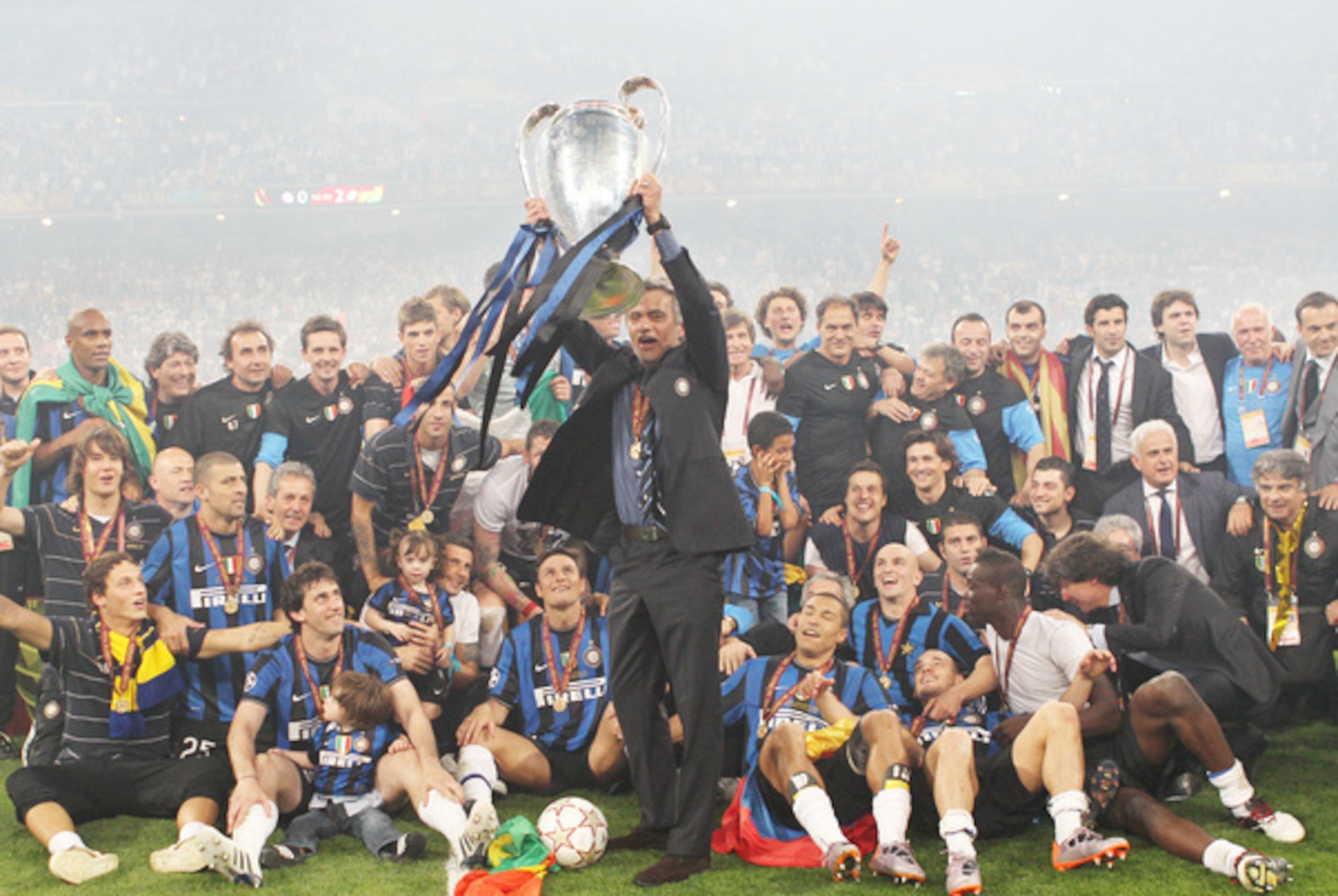 Mourinho lifts the Champions League trophy with his Inter Milan side in the 2009/10 campaign.