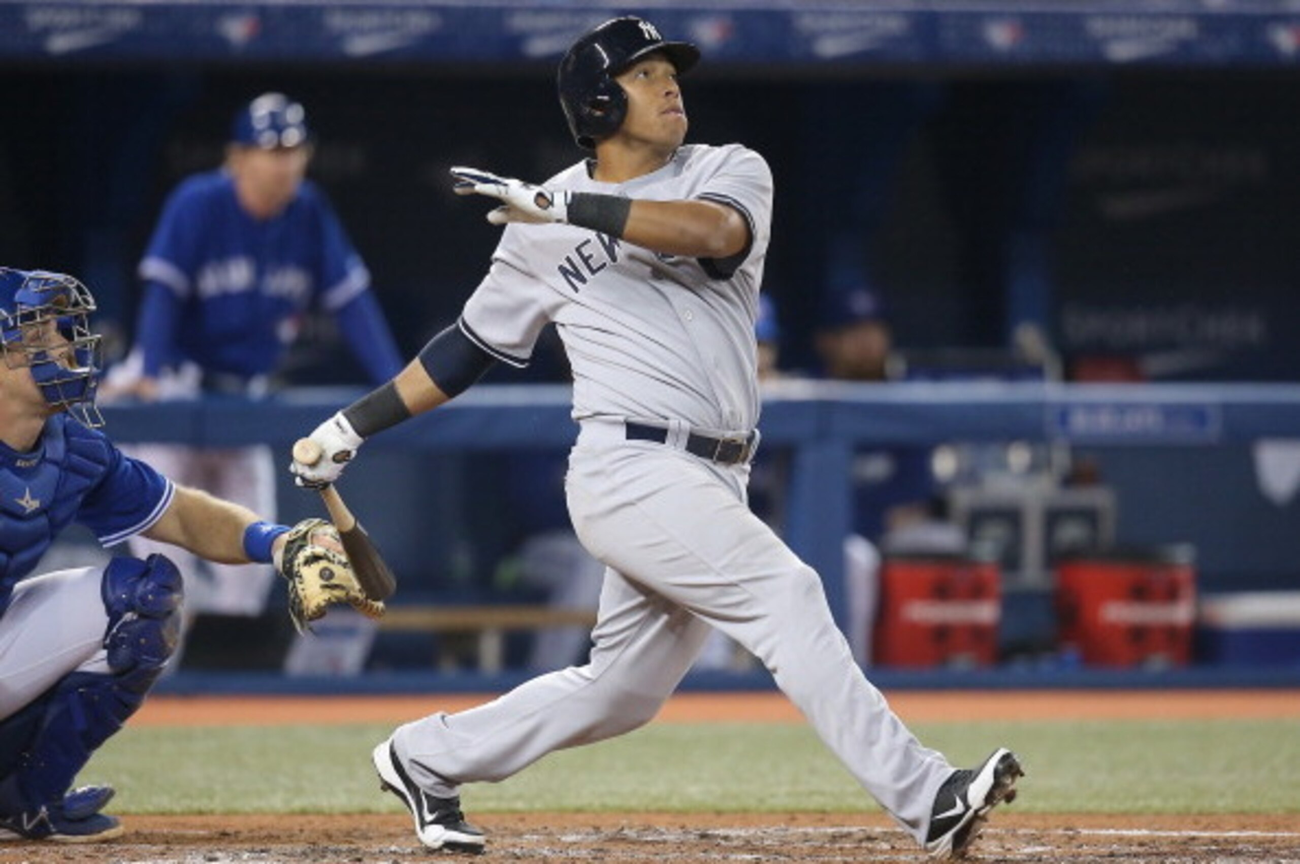 TORONTO, CANADA - APRIL 6: Yangervis Solarte #26 of the New York Yankees hits an RBI double in the fourth inning during MLB game action against the Toronto Blue Jays on April 6, 2014 at Rogers Centre in Toronto, Ontario, Canada. (Photo by Tom Szczerbowski TORONTO, CANADA - APRIL 6: Yangervis Solarte #26 of the New York Yankees hits an RBI double in the fourth inning during MLB game action against the Toronto Blue Jays on April 6, 2014 at Rogers Centre in Toronto, Ontario, Canada. (Photo by Tom Szczerbowski