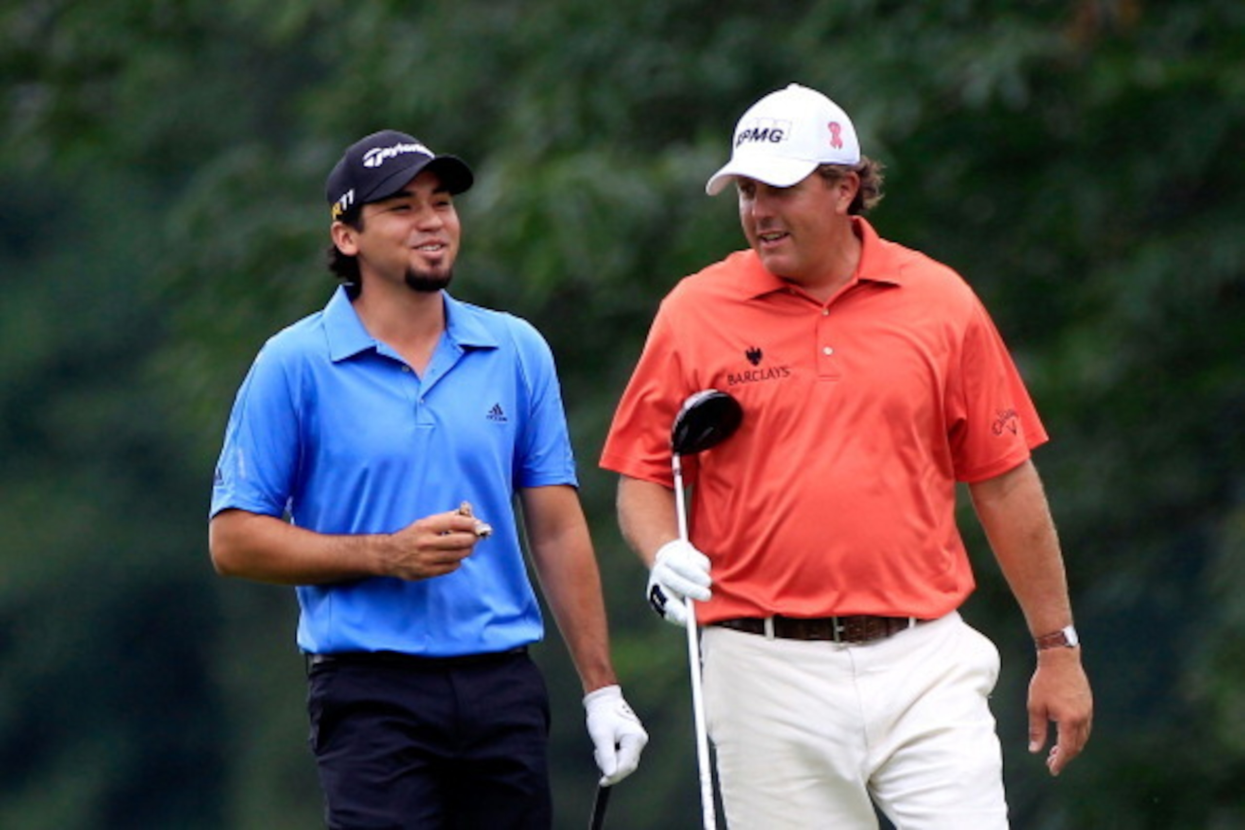 AKRON, OH - AUGUST 04: (L-R) Jason Day of Australia and Phil Mickelson walk up the 16th fairway during the first round of the World Golf Championships-Bridgestone Invitational on the South Course at Firestone Country Club on August 4, 2011 in Akron, Ohio AKRON, OH - AUGUST 04: (L-R) Jason Day of Australia and Phil Mickelson walk up the 16th fairway during the first round of the World Golf Championships-Bridgestone Invitational on the South Course at Firestone Country Club on August 4, 2011 in Akron, Ohio