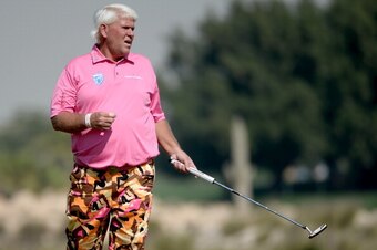 DOHA, QATAR - JANUARY 23:  John Daly of the USA in action during the second round of the Comercial Bank Qatar Masters at the Doha Golf Club on January 23, 2014 in Doha, Qatar.  (Photo by Ross Kinnaird/Getty Images)