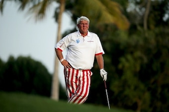 DUBAI, UNITED ARAB EMIRATES - JANUARY 30:  John Daly of the USA looks on during the first round of the 2014 Omega Dubai Desert Classic on the Majlis Course at the Emirates Golf Club on January 30, 2014 in Dubai, United Arab Emirates.  (Photo by Francois N