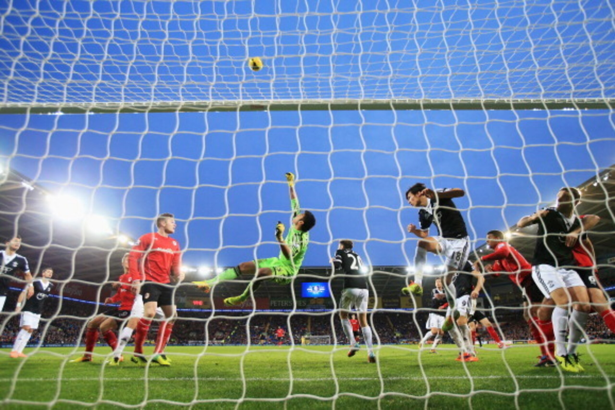CARDIFF, WALES - DECEMBER 26:  Goalkeeper Paulo Gazzaniga of Southampton makes a save during the Barclays Premier League match between Cardiff City and Southampton at Cardiff City Stadium on December 26, 2013 in Cardiff, Wales.  (Photo by Richard Heathcot