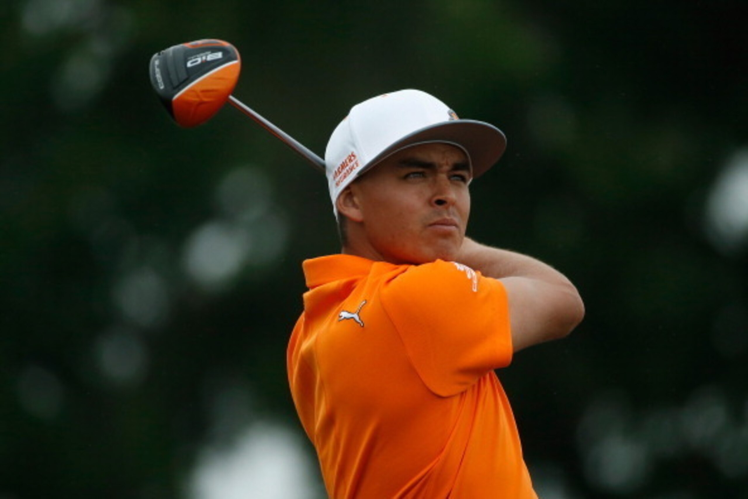 HUMBLE, TX - APRIL 06:  Rickie Fowler of the United States watches his shot on the eighteenth hole during the final round of the Shell Houston Open at the Golf Club of Houston on April 6, 2014 in Humble, Texas.  (Photo by Scott Halleran/Getty Images)