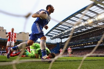 LONDON, ENGLAND - APRIL 05:  Frank Lampard of Chelsea celebrates scoring their second goal from the rebound of his penalty during the Barclays Premier League match between Chelsea and Stoke City at Stamford Bridge on April 5, 2014 in London, England.  (Ph
