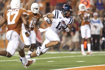 AUSTIN, TX - SEPTEMBER 14: Evan Engram #17 of the Mississippi Rebels breaks free for a 17 yard touchdown against the Texas Longhorns on September 14, 2013 at Darrell K Royal-Texas Memorial Stadium in Austin, Texas.  (Photo by Cooper Neill/Getty Images)