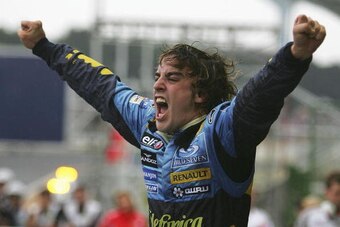 SAO PAULO, BRAZIL - SEPTEMBER 25:  Fernando Alonso of Spain and Renault celebrates winning the World Championship after finishing third in the Brazilian F1 Grand Prix at the Autodromo Interlagos on September 25, 2005 in Sao Paulo, Brazil.  (Photo by Clive