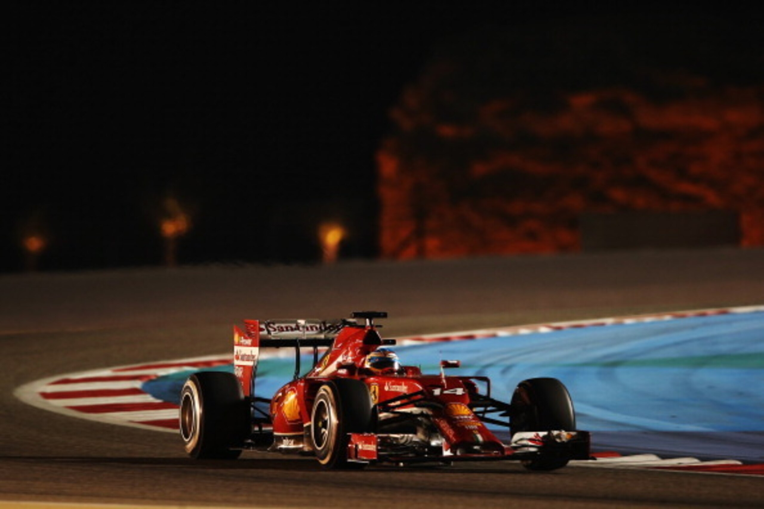 SAKHIR, BAHRAIN - APRIL 06:  Fernando Alonso of Spain and Ferrari drives during the Bahrain Formula One Grand Prix at the Bahrain International Circuit on April 6, 2014 in Sakhir, Bahrain.  (Photo by Mark Thompson/Getty Images)