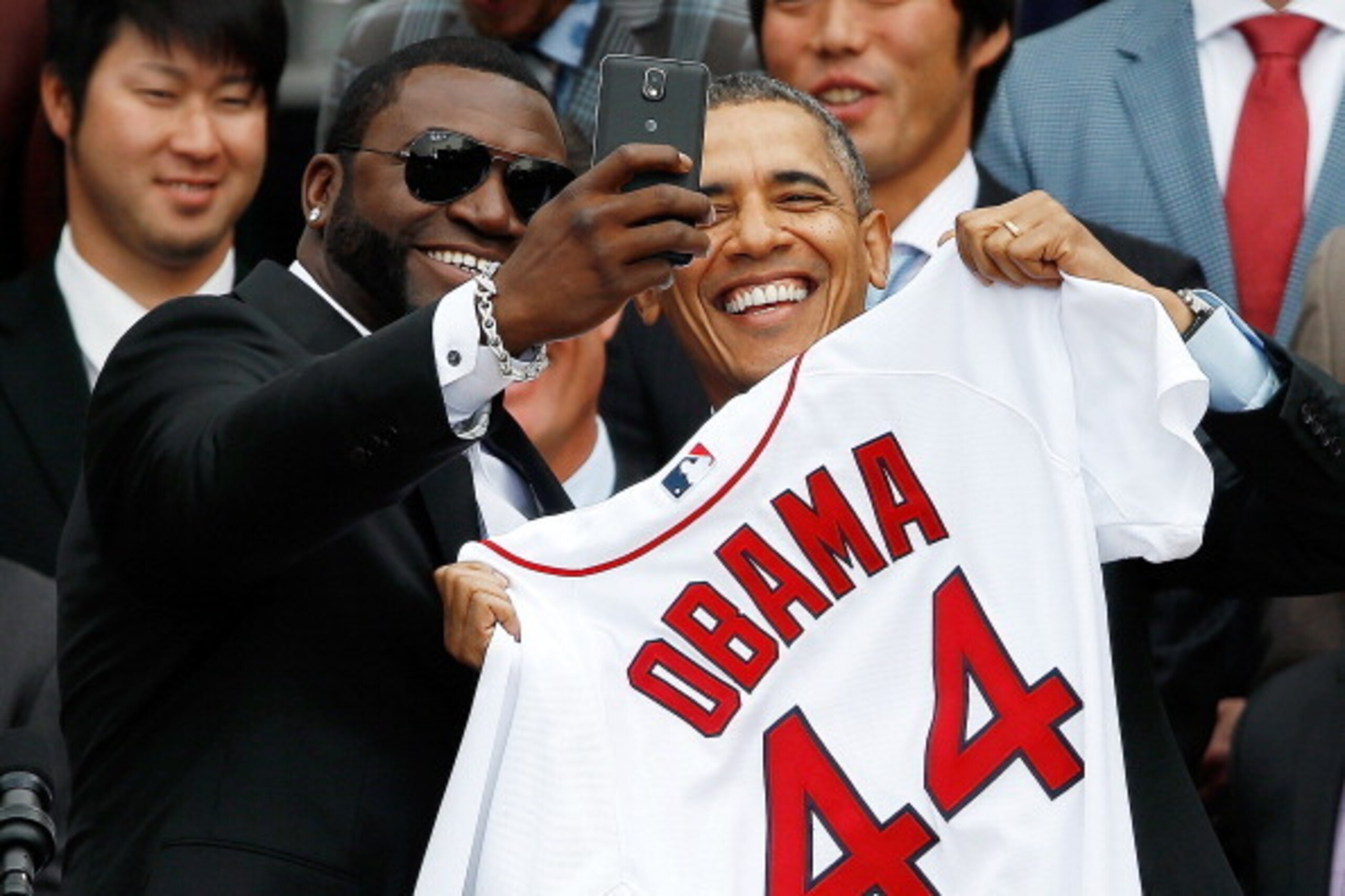 WASHINGTON, DC - APRIL 01:  Boston Red Sox designated hitter David Ortiz (L) poses for a 'selfie' with U.S. President Barack Obama during a ceremony on the South Lawn of the White House to honor the 2013 World Series Champion Boston Red Sox April 1, 2014 