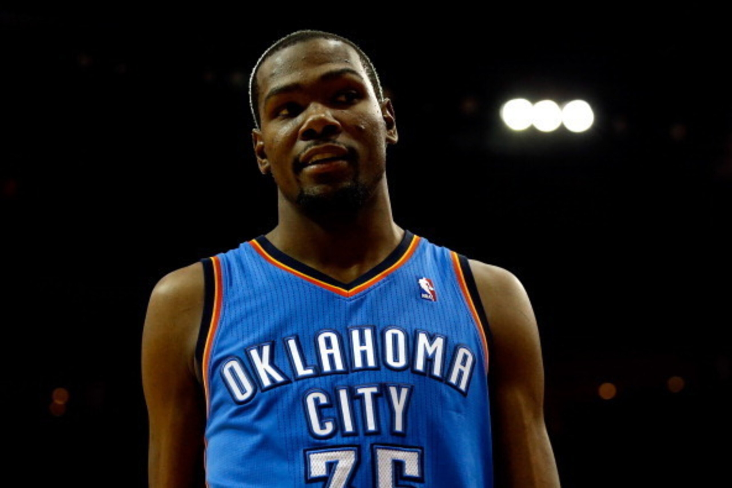 HOUSTON, TX - APRIL 04:  Kevin Durant #35 of the Oklahoma City Thunder looks on against the Houston Rockets during a game at the Toyota Center on April 4, 2014 in Houston, Texas. NOTE TO USER: User expressly acknowledges and agrees that, by downloading an
