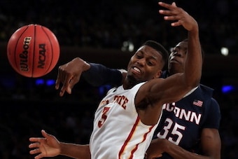 NEW YORK, NY - MARCH 28:  Amida Brimah #35 of the Connecticut Huskies blocks the shot of Melvin Ejim #3 of the Iowa State Cyclones during the regional semifinal of the 2014 NCAA Men's Basketball Tournament at Madison Square Garden on March 28, 2014 in New