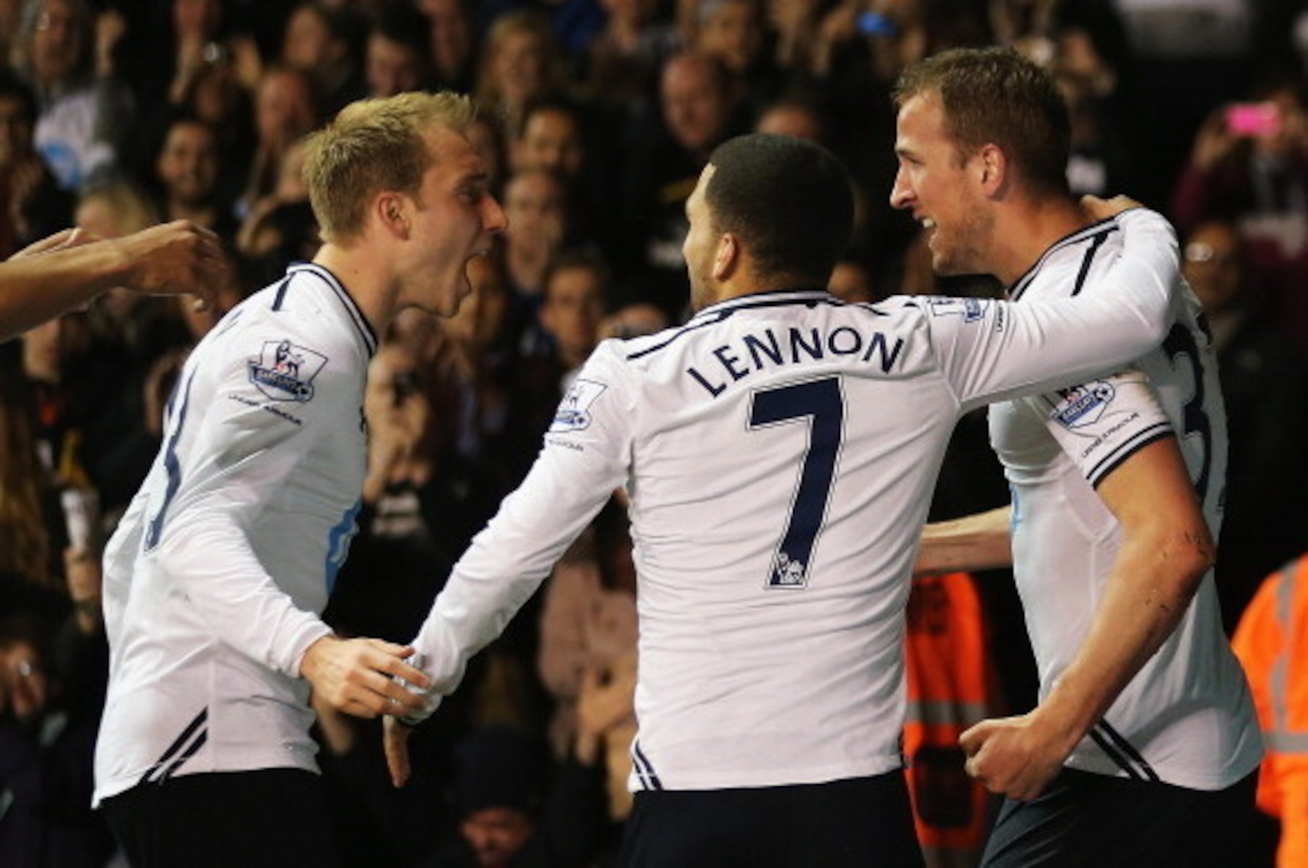 LONDON, ENGLAND - APRIL 07:  Harry Kane (R) of Tottenham Hotspur celebrates scoring his team's second goal with Christian Eriksen (L) and Aaron Lennon during the Barclays Premier League match between Tottenham Hotspur and Sunderland at White Hart Lane on 