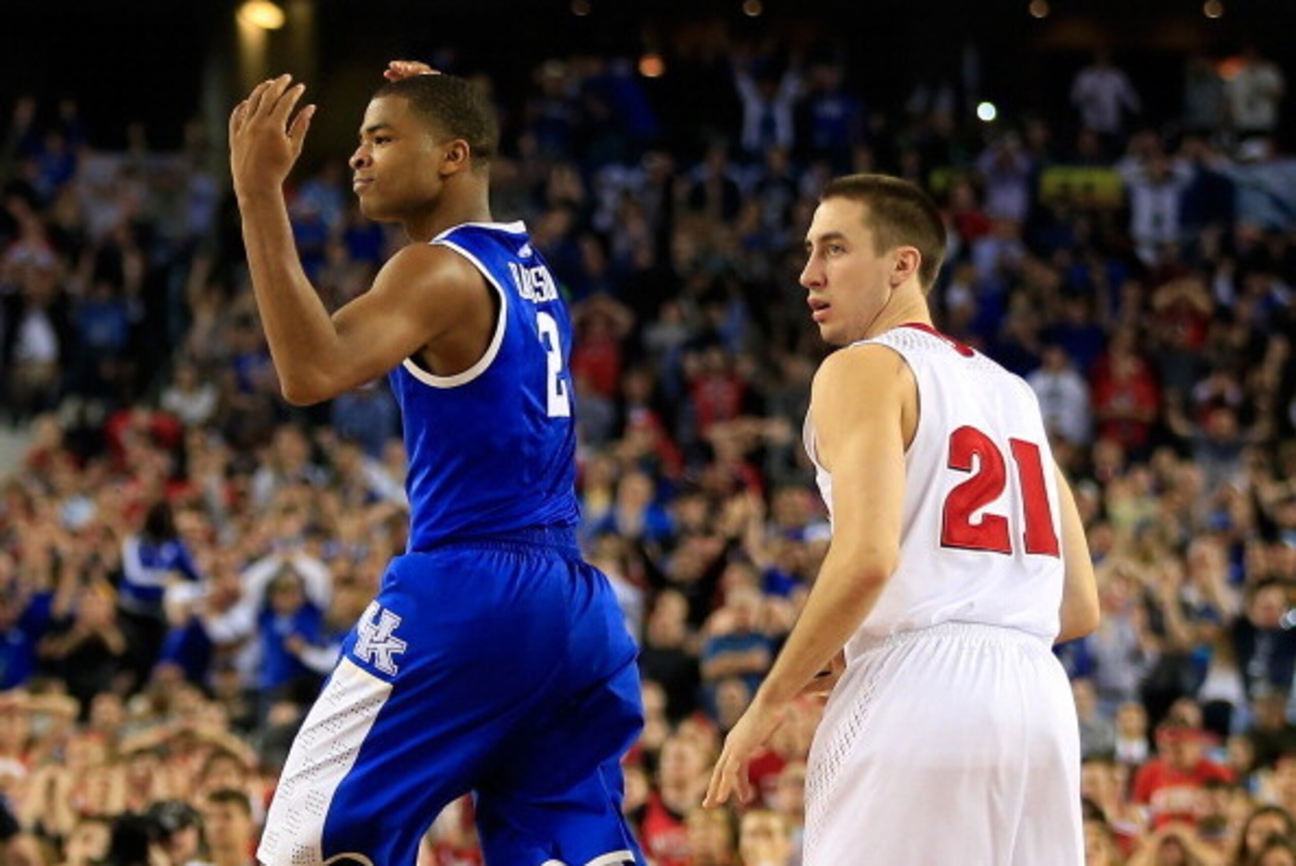 ARLINGTON, TX - APRIL 05: Aaron Harrison #2 of the Kentucky Wildcats reacts after hitting the game winning shot to defeat the Wisconsin Badgers 74-73 in the NCAA Men's Final Four Semifinal at AT&T Stadium on April 5, 2014 in Arlington, Texas. (Photo by J ARLINGTON, TX - APRIL 05: Aaron Harrison #2 of the Kentucky Wildcats reacts after hitting the game winning shot to defeat the Wisconsin Badgers 74-73 in the NCAA Men's Final Four Semifinal at AT&T Stadium on April 5, 2014 in Arlington, Texas. (Photo by J