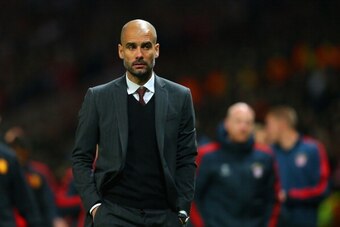 MANCHESTER, ENGLAND - APRIL 01:  Pep Guardiola head coach of Bayern Muenchen at the end of match during the UEFA Champions League Quarter Final first leg match between Manchester United and FC Bayern Muenchen at Old Trafford on April 1, 2014 in Manchester
