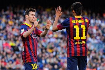 BARCELONA, SPAIN - APRIL 05:  Neymar of FC Barcelona celebrates with his team-mate Lionel Messi (L) of FC Barcelona during the La Liga match between FC Barcelona and Real Betis Balompie at Camp Nou on April 5, 2014 in Barcelona, Spain.  (Photo by David Ra