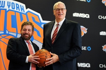 NEW YORK, NY - MARCH 18:  James Dolan, L, Executive Chairman of Madison Square Garden, stands with Phil Jackson during the press conference to announce Jackson as President of the New York Knicks at Madison Square Garden on March 18, 2014 in New York City