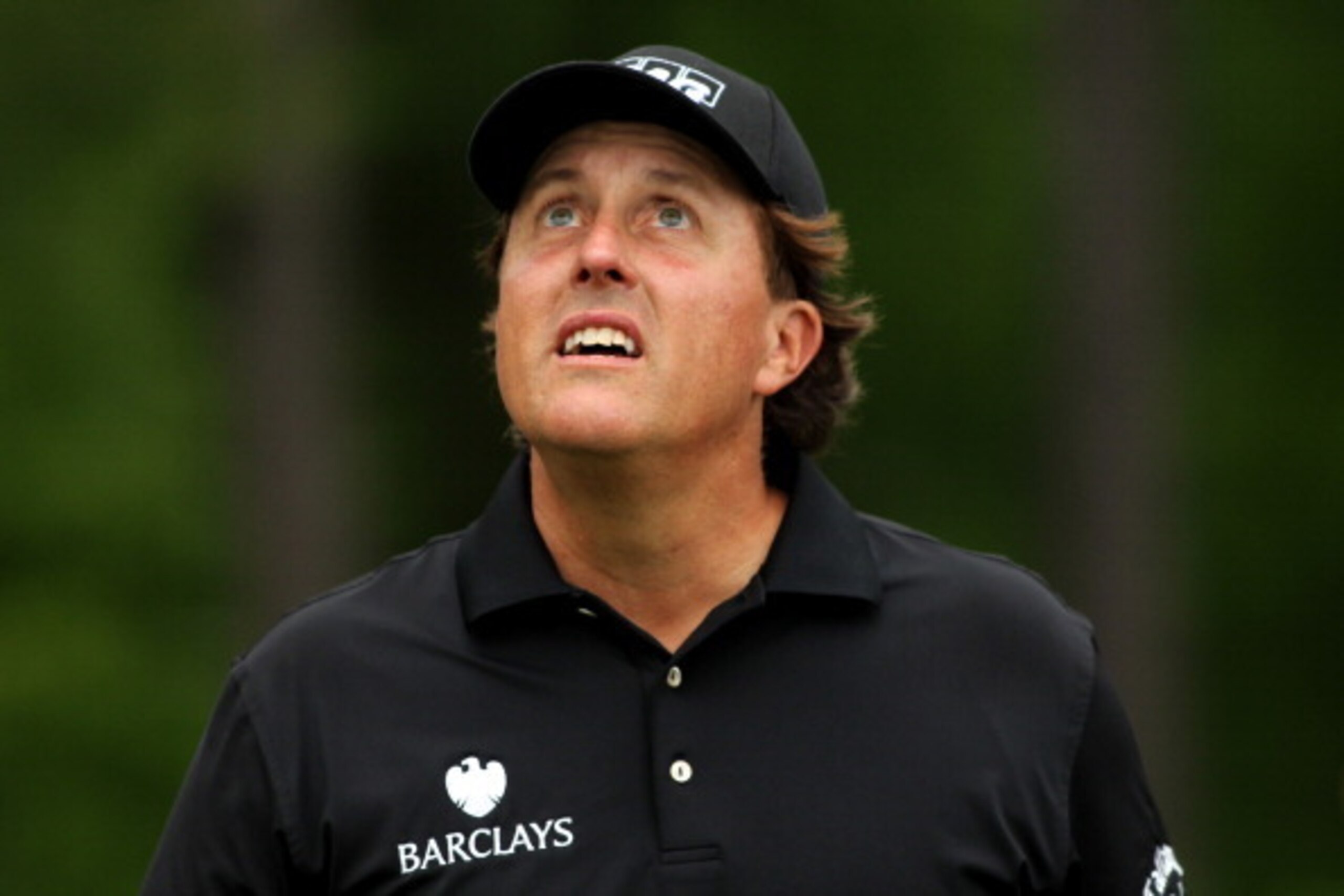 HUMBLE, TX - APRIL 03:  Phil Mickelson of the United States looks on from the thirteenth hole during round one of the Shell Houston Open at the Golf Club of Houston on April 3, 2014 in Humble, Texas.  (Photo by Justin Heiman/Getty Images)