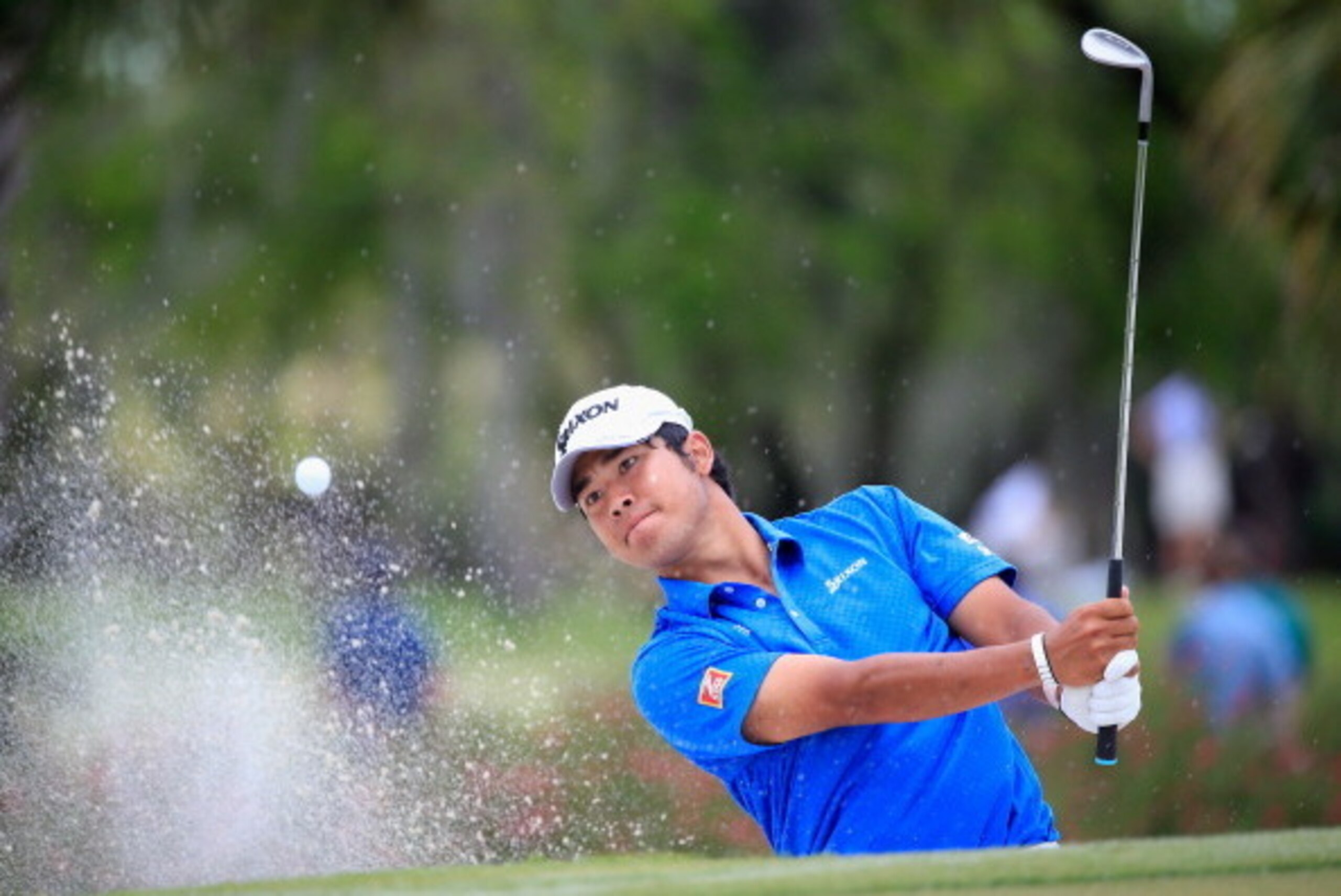 DORAL, FL - MARCH 09:  Hideki Matsuyama of Japan plays a  bunker shot on the sixth hole during the final round of the World Golf Championships-Cadillac Championship at Trump National Doral on March 9, 2014 in Doral, Florida.  (Photo by Jamie Squire/Getty 