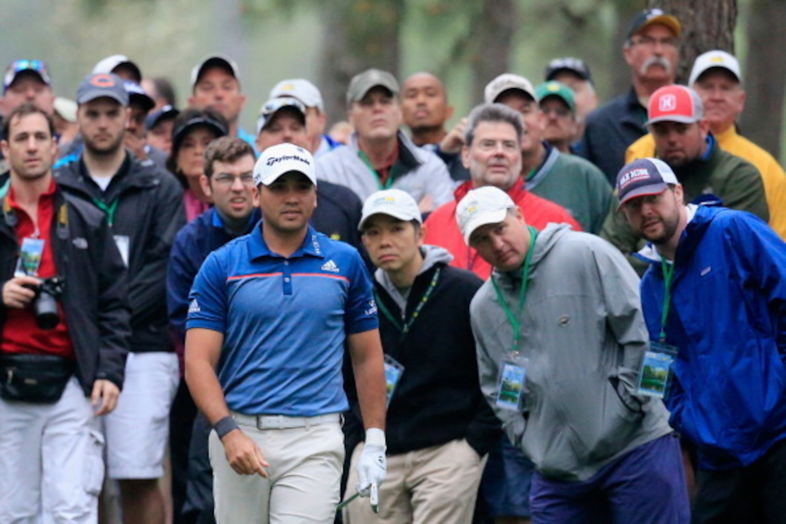 AUGUSTA, GA - APRIL 07:  Jason Day of Australia walks after hitting a shot as a gallery of fans look on during a practice round prior to the start of the 2014 Masters Tournament at Augusta National Golf Club on April 7, 2014 in Augusta, Georgia.  (Photo b