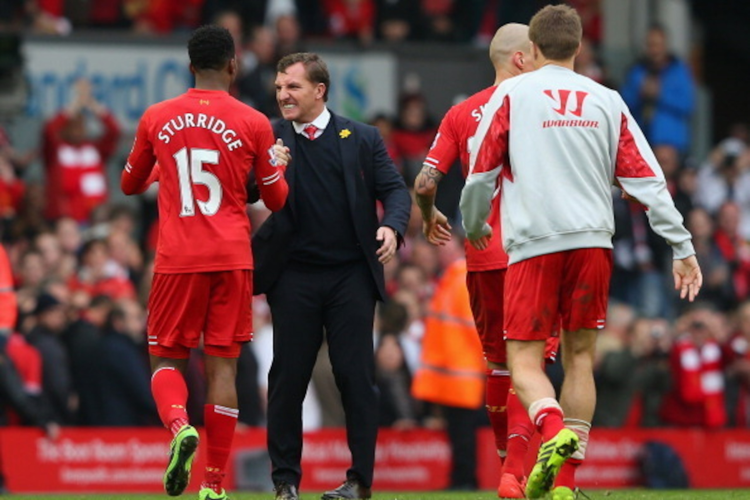 LIVERPOOL, ENGLAND - MARCH 30:  Liverpool Manager Brendan Rodgers congratulates Daniel Sturridge of Liverpool at the end of the Barclays Premier League match between Liverpool and Tottenham Hotspur at Anfield on March 30, 2014 in Liverpool, England.  (Pho