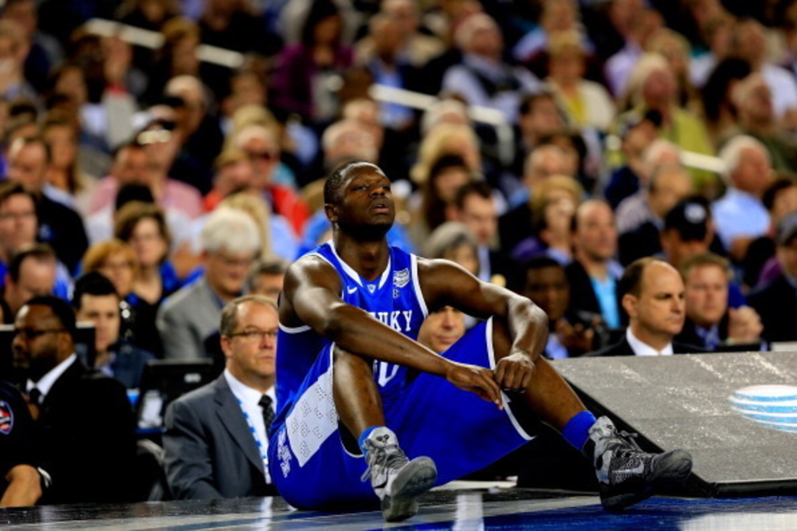 ARLINGTON, TX - APRIL 07: Julius Randle #30 of the Kentucky Wildcats sits on the court during the NCAA Men's Final Four Championship against the Connecticut Huskies at AT&T Stadium on April 7, 2014 in Arlington, Texas.  (Photo by Jamie Squire/Getty Images