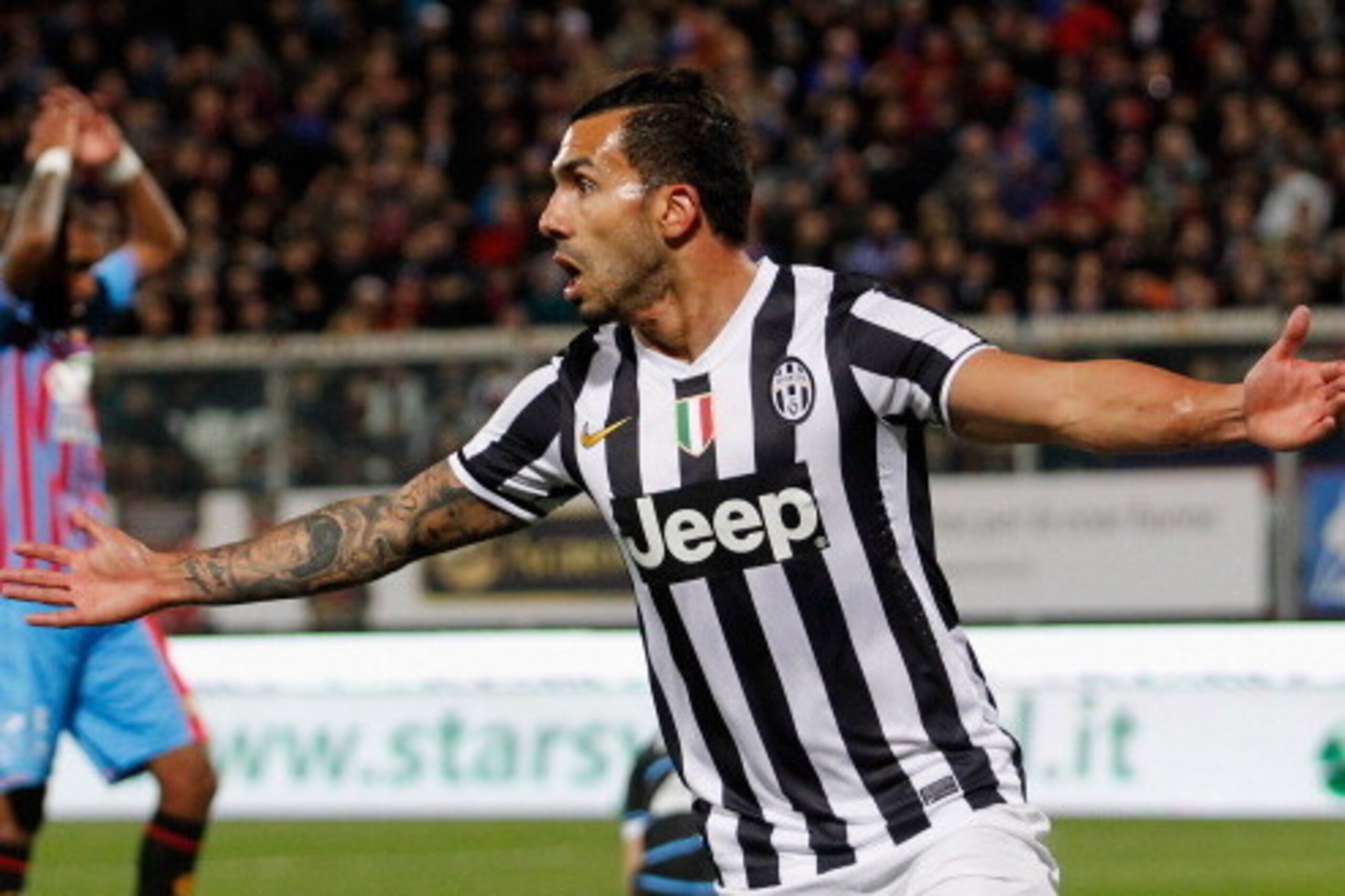 CATANIA, ITALY - MARCH 23:  Carlos Tevz of Juventus celebrates after scoring the opening goal during the Serie A match between Calcio Catania and Juventus at Stadio Angelo Massimino on March 23, 2014 in Catania, Italy.  (Photo by Maurizio Lagana/Getty Ima