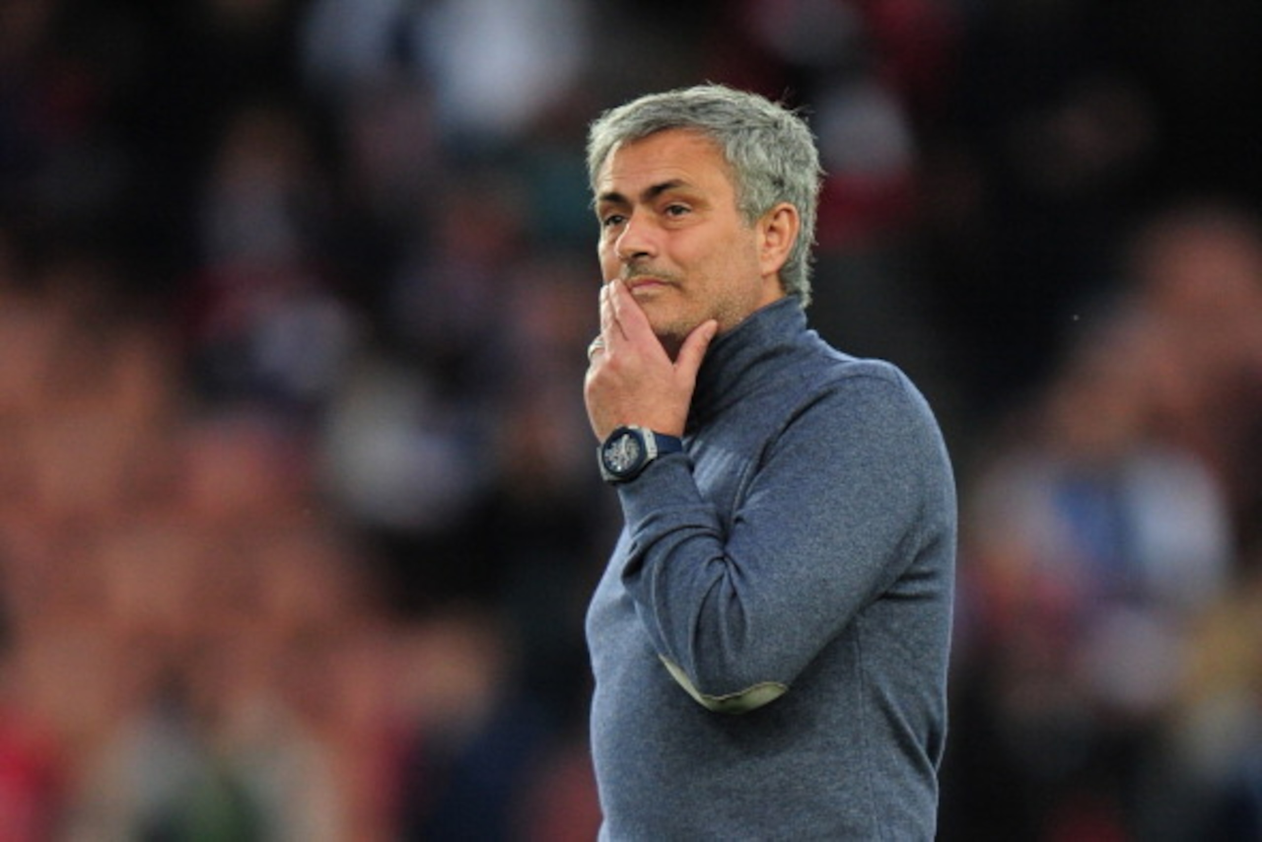 PARIS, FRANCE - APRIL 02:  Jose Mourinho the Chelsea manager watches over the pre-match warm up prior to kickoff during the UEFA Champions League quarter final, first leg match between Paris Saint Germain and Chelsea at Parc des Princes on April 2, 2014 i