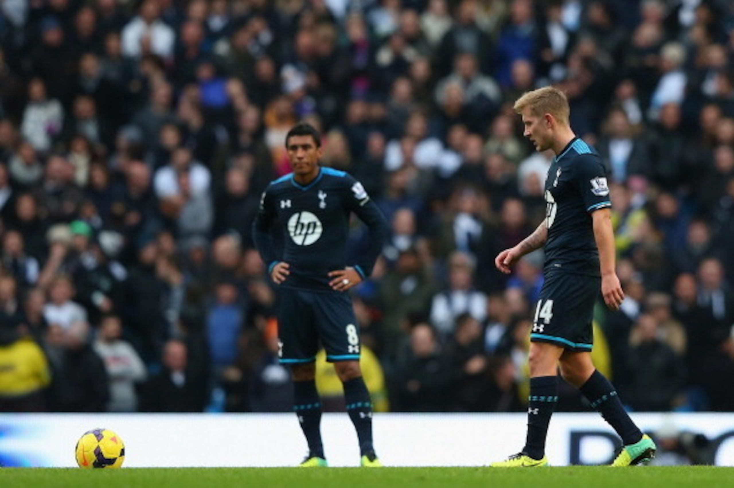 MANCHESTER, ENGLAND - NOVEMBER 24:  Lewis Holtby and Paulinho of Tottenham Hotspur look on after conceding the second goal during the Barclays Premier League match between Manchester City and Tottenham Hotspur at Etihad Stadium on November 24, 2013 in Man