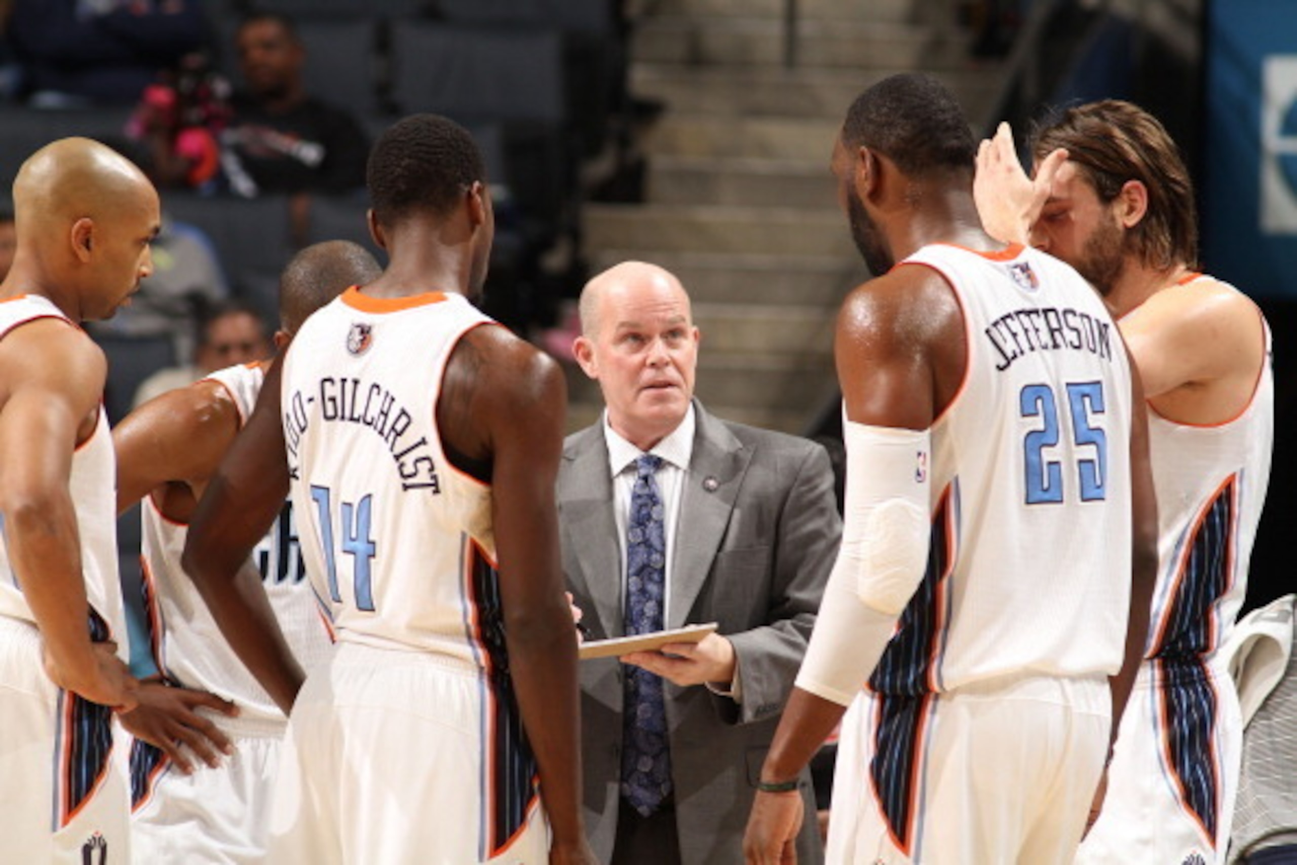 CHARLOTTE, NC - NOVEMBER 11:  Steve Clifford, Head Coach of the Charlotte Bobcats consults with his team during the game against the Atlanta Hawks at the Time Warner Cable Arena on November 11, 2013 in Charlotte, North Carolina.  NOTE TO USER: User expres