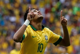 BRASILIA, BRAZIL - JUNE 15:  Neymar of Brazil celebrates scoring his team's opening goal during the FIFA Confederations Cup Brazil 2013 Group A match between Brazil and Japan at National Stadium on June 15, 2013 in Brasilia, Brazil.  (Photo by Dean Mouhta