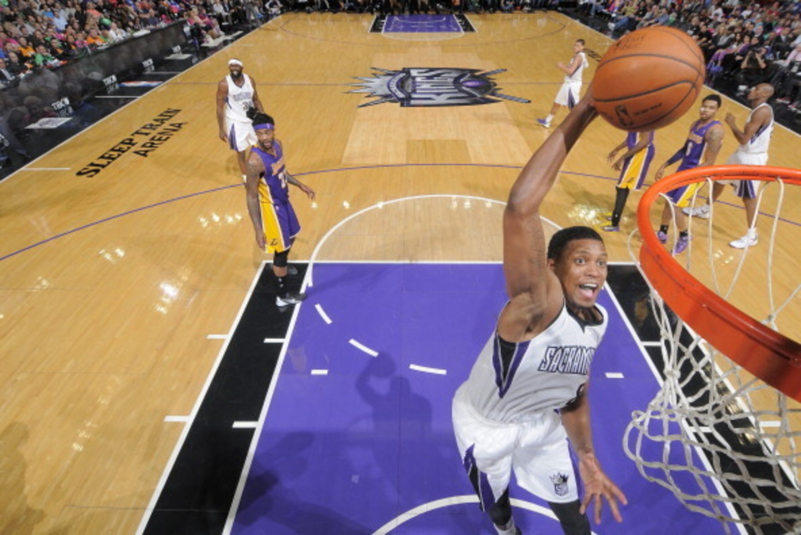 SACRAMENTO, CA - APRIL 2:  Rudy Gay #8 of the Sacramento Kings dunks against the Los Angeles Lakers at Sleep Train Arena on April 2, 2014 in Sacramento, California. NOTE TO USER: User expressly acknowledges and agrees that, by downloading and or using thi