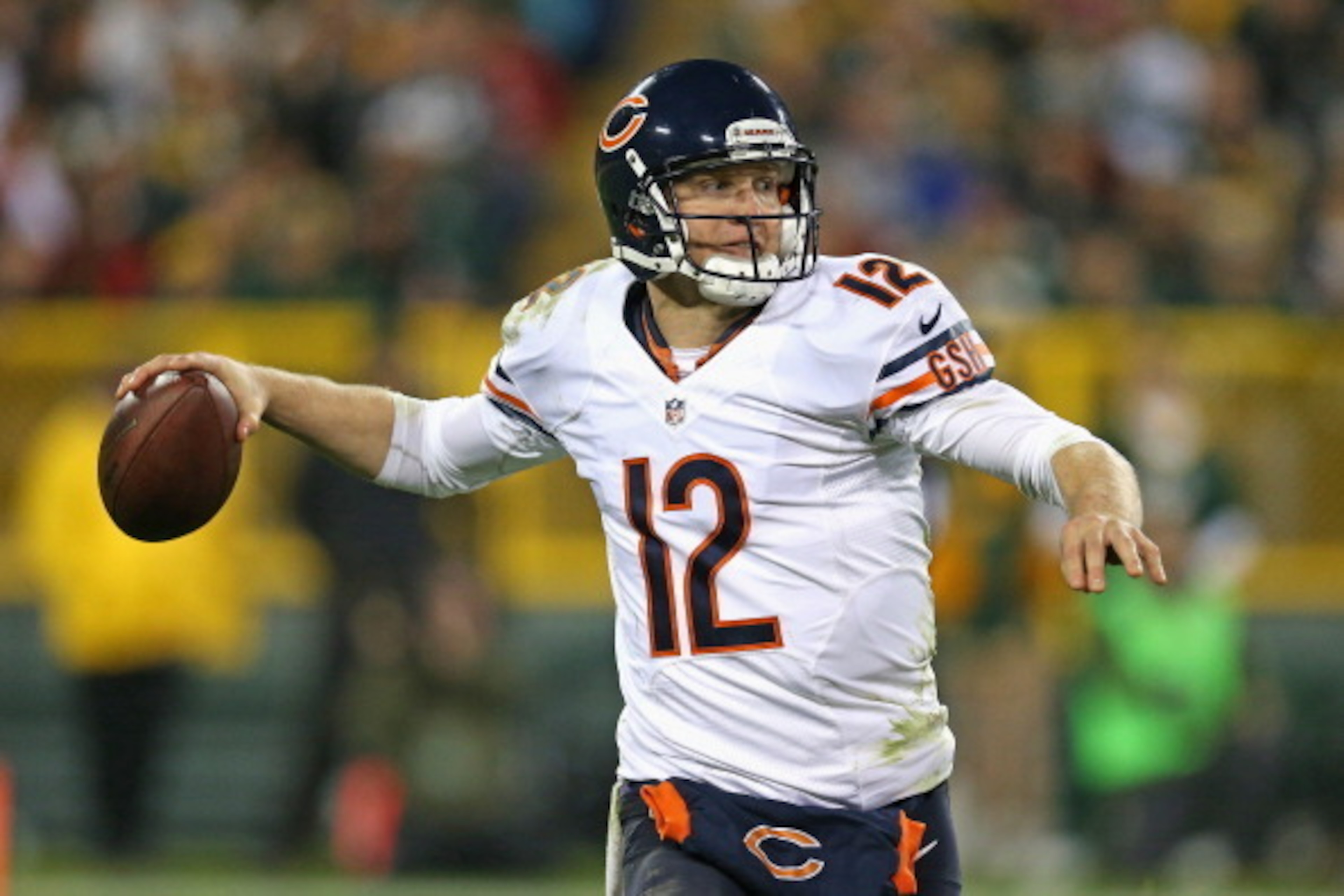 GREEN BAY, WI - NOVEMBER 04:  Josh McCown #12 of the Chicago Bears passes against the Green Bay Packers at Lambeau Field on November 4, 2013 in Green Bay, Wisconsin. The Bears defeated the Packers 27-20.  (Photo by Jonathan Daniel/Getty Images)