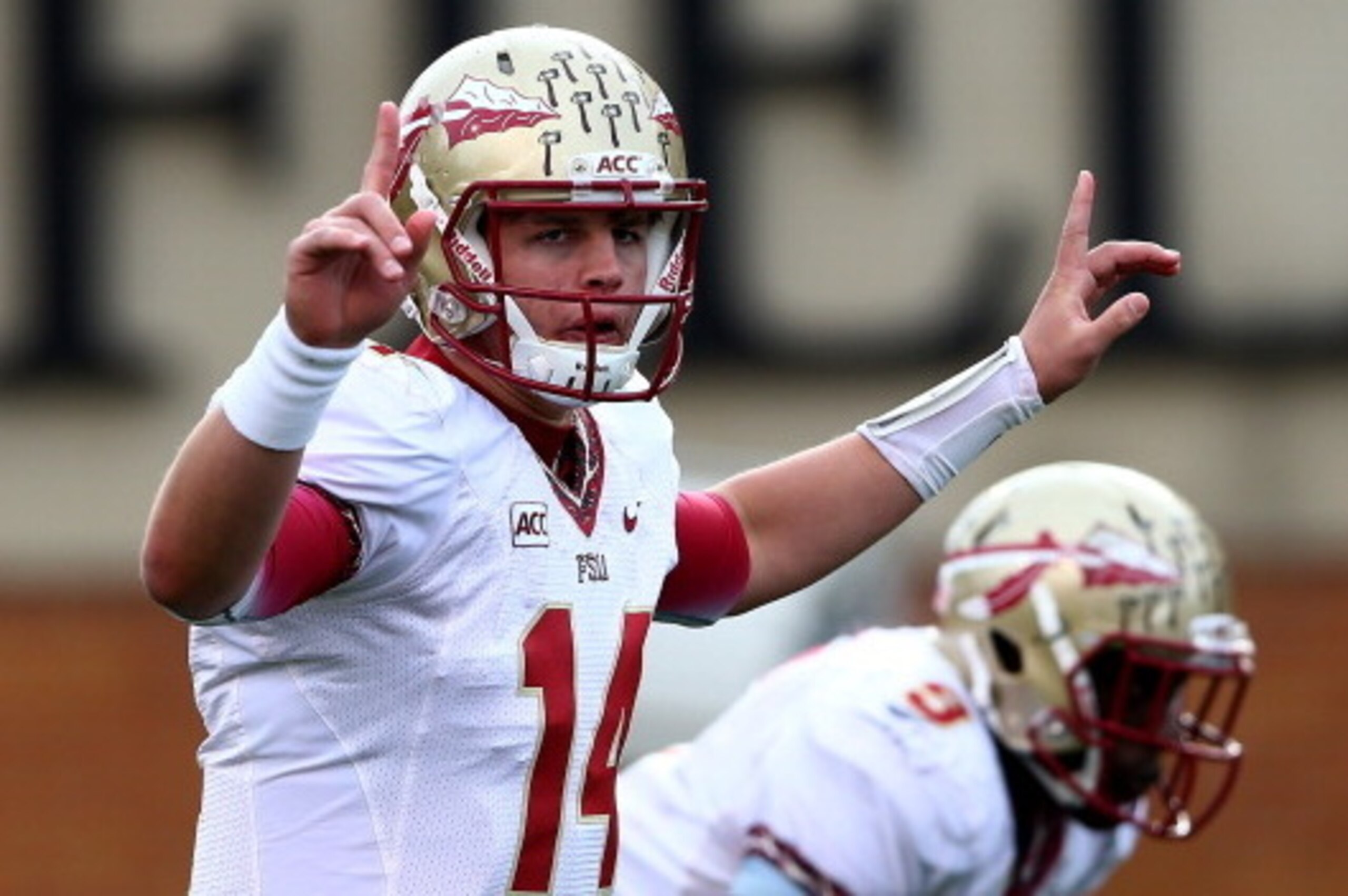 WINSTON SALEM, NC - NOVEMBER 09:  Jacob Coker #14 of the Florida State Seminoles calls a play against the Wake Forest Demon Deacons during their game at BB&T Field on November 9, 2013 in Winston Salem, North Carolina.  (Photo by Streeter Lecka/Getty Image