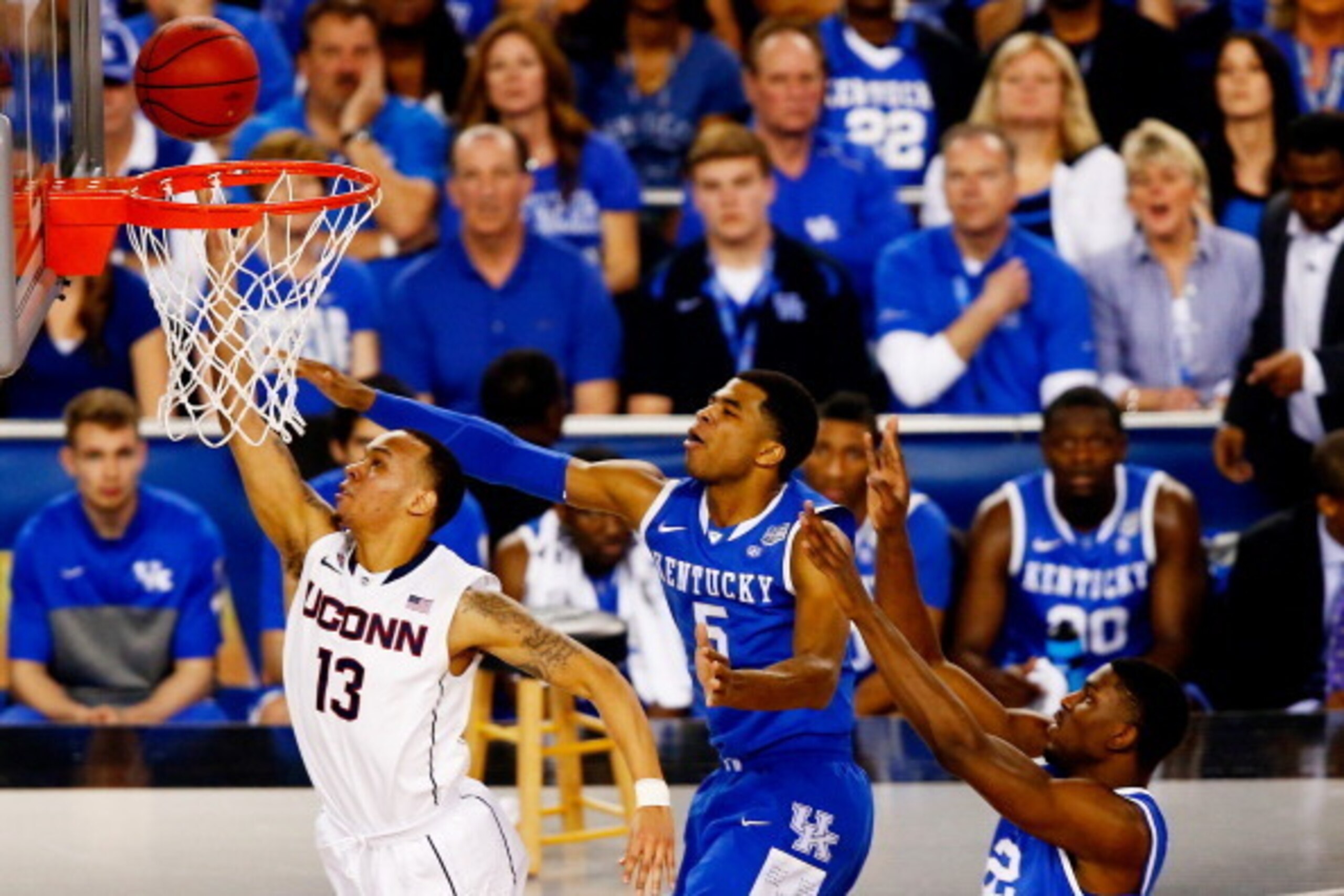 ARLINGTON, TX - APRIL 07: Shabazz Napier #13 of the Connecticut Huskies goes to the basket as Andrew Harrison #5 of the Kentucky Wildcats defends during the NCAA Men's Final Four Championship at AT&T Stadium on April 7, 2014 in Arlington, Texas.  (Photo b