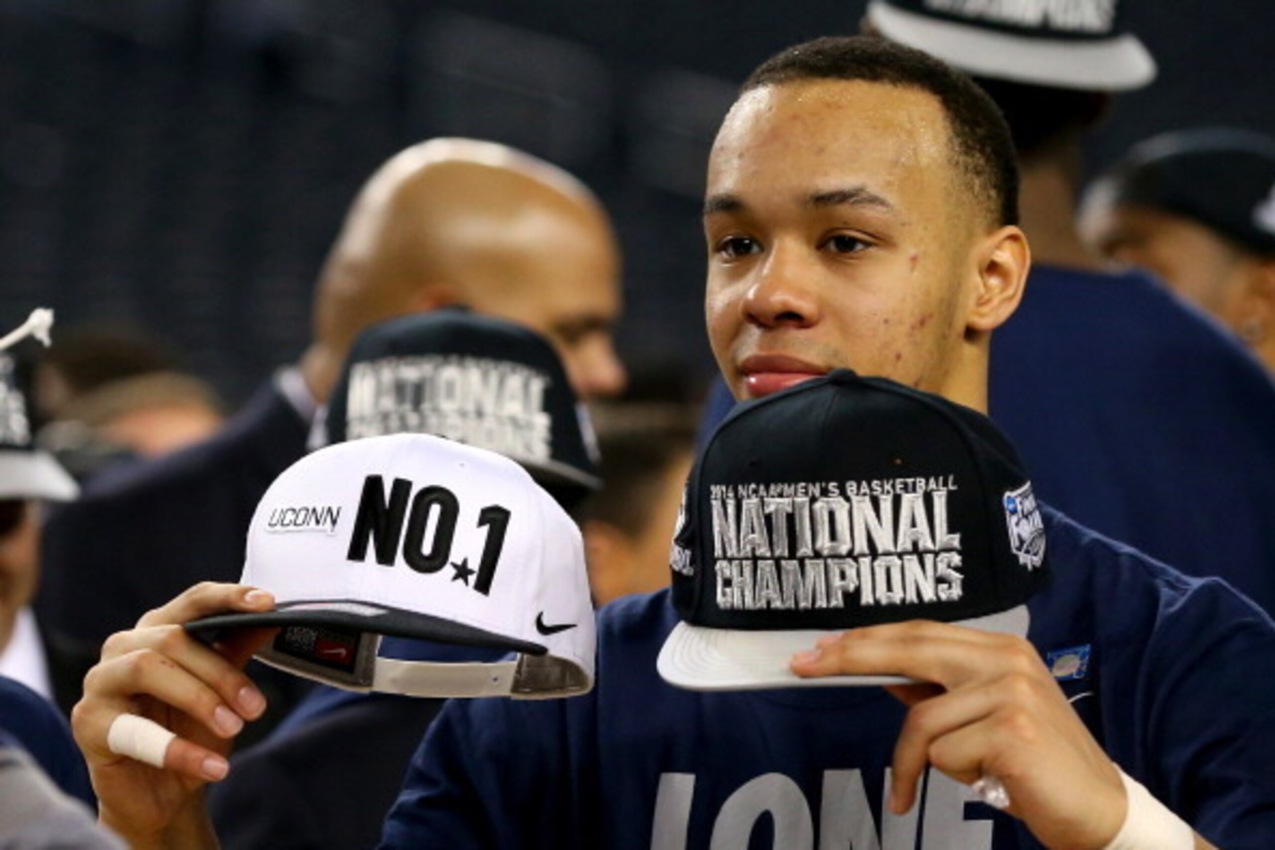 ARLINGTON, TX - APRIL 07: Shabazz Napier #13 of the Connecticut Huskies celebrates on the court after defeating the Kentucky Wildcats 60-54 in the NCAA Men's Final Four Championship at AT&T Stadium on April 7, 2014 in Arlington, Texas.  (Photo by Ronald M