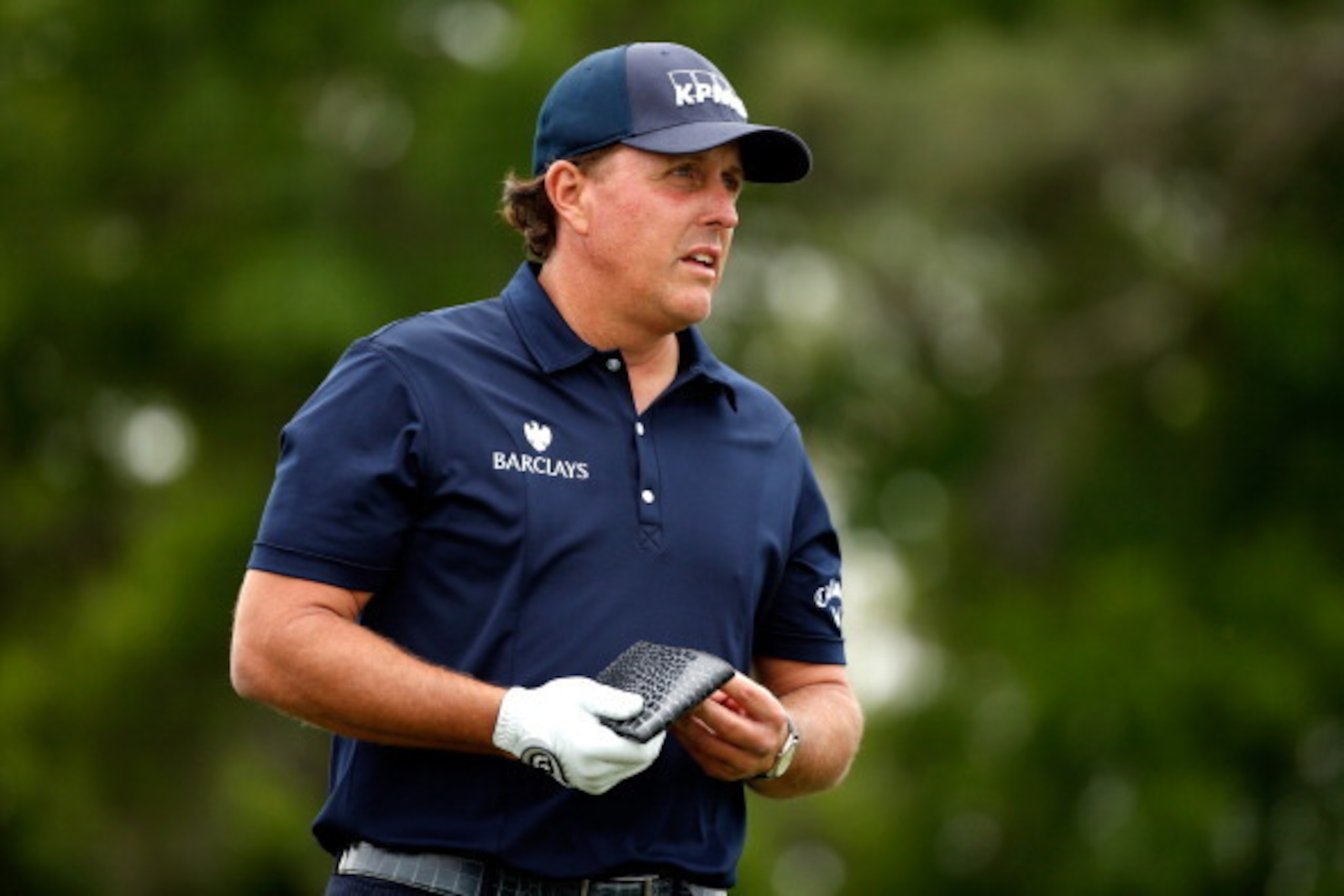 HUMBLE, TX - APRIL 05:  Phil Mickelson of the United States looks on from the eighteenth hole during round three of the Shell Houston Open at the Golf Club of Houston on April 5, 2014 in Humble, Texas.  (Photo by Scott Halleran/Getty Images)