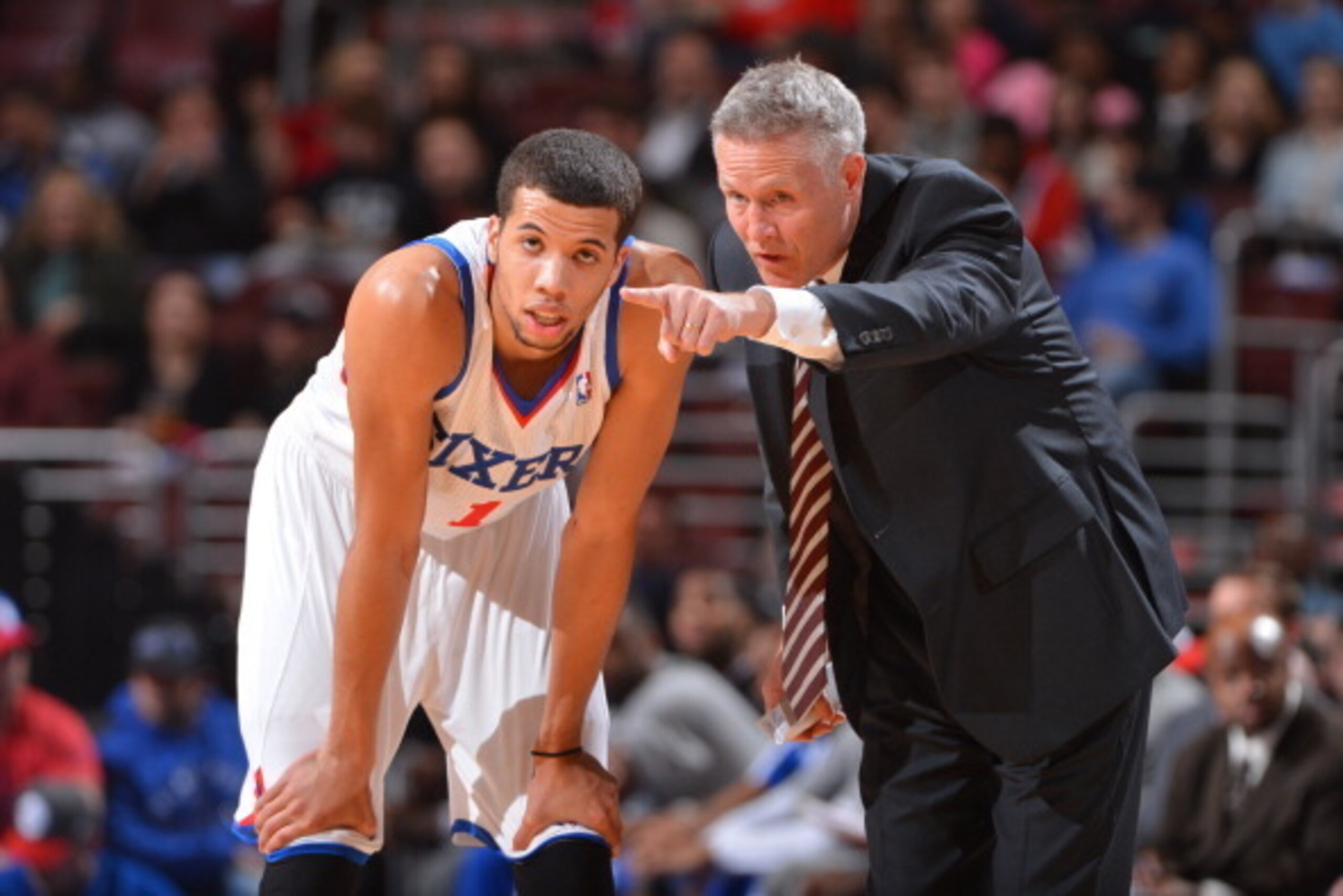 PHILADELPHIA, PA - MARCH 12: Brett Brown of the Philadelphia 76ers talks with Michael Carter-Williams #1 during the game against the Sacramento Kings at the Wells Fargo Center on March 12, 2014 in Philadelphia, Pennsylvania. NOTE TO USER: User expressly PHILADELPHIA, PA - MARCH 12: Brett Brown of the Philadelphia 76ers talks with Michael Carter-Williams #1 during the game against the Sacramento Kings at the Wells Fargo Center on March 12, 2014 in Philadelphia, Pennsylvania. NOTE TO USER: User expressly