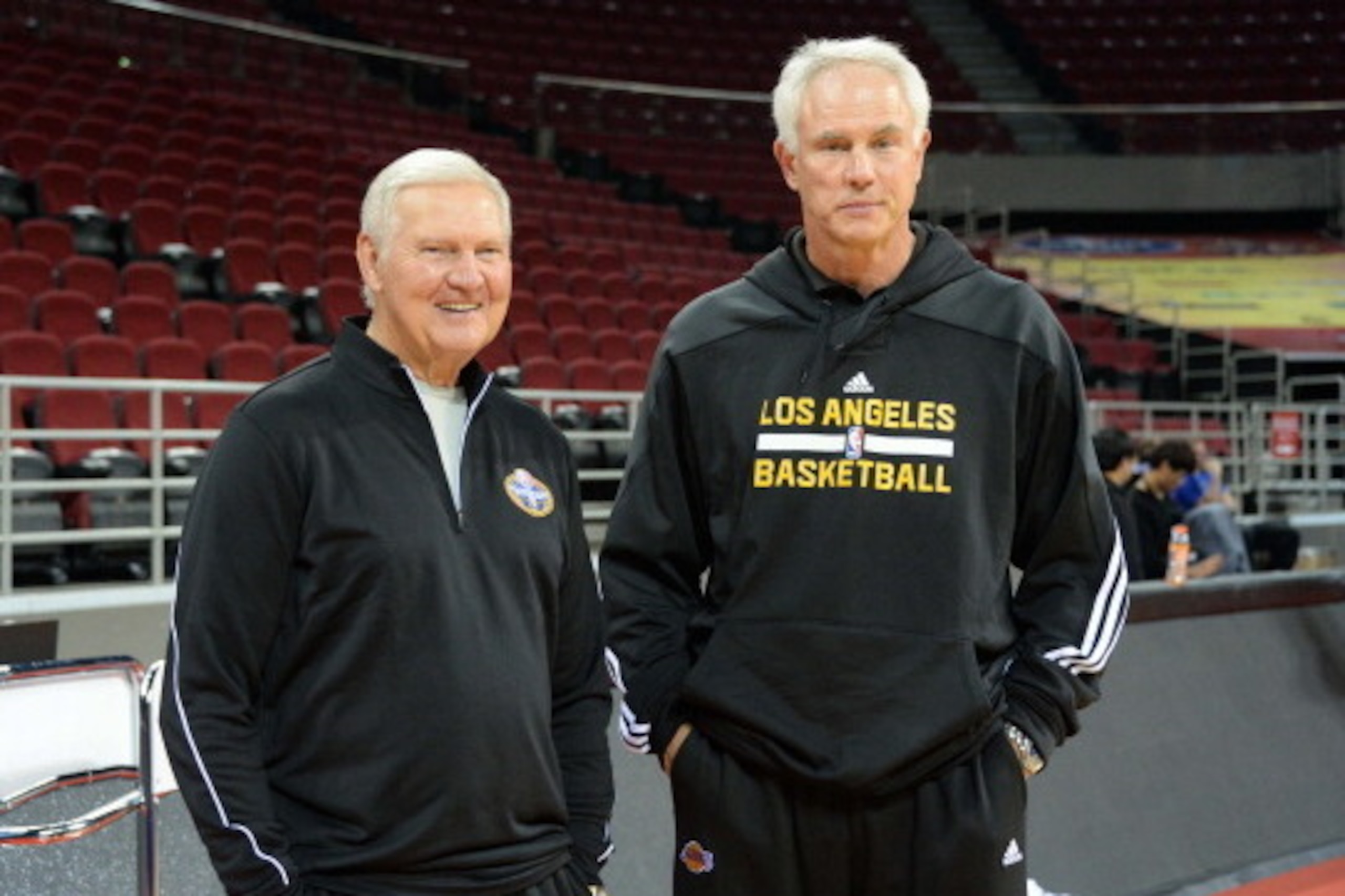 BEIJING, CHINA - OCTOBER 13: General Manager Mitch Kupchak of the Los Angeles Lakers speaks Jerry West of the Golden State Warriors after practice as part of 2013 Global Games on October 13, 2013 at MasterCard Center in Beijing, China. NOTE TO USER: User