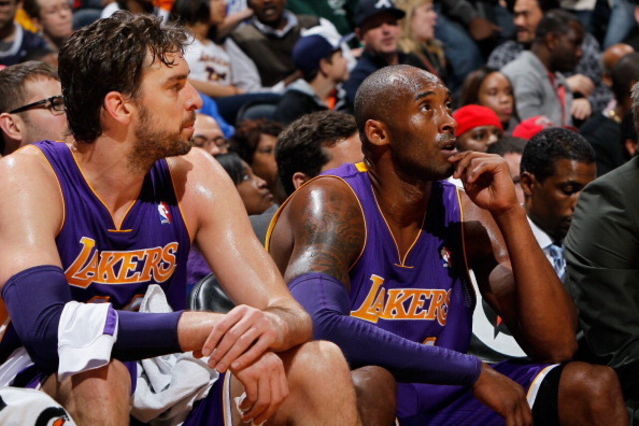 ATLANTA, GA - DECEMBER 16:  Pau Gasol #16 and Kobe Bryant #24 of the Los Angeles Lakers against the Atlanta Hawks at Philips Arena on December 16, 2013 in Atlanta, Georgia.  NOTE TO USER: User expressly acknowledges and agrees that, by downloading and or 