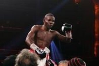 Apr 13, 2013; New York, NY, USA; Guillermo Rigondeaux celebrates his 12-round unanimous decision win over Nonito Donaire (not shown) at Radio City Music Hall. Mandatory Credit: Ed Mulholland-USA TODAY Sports