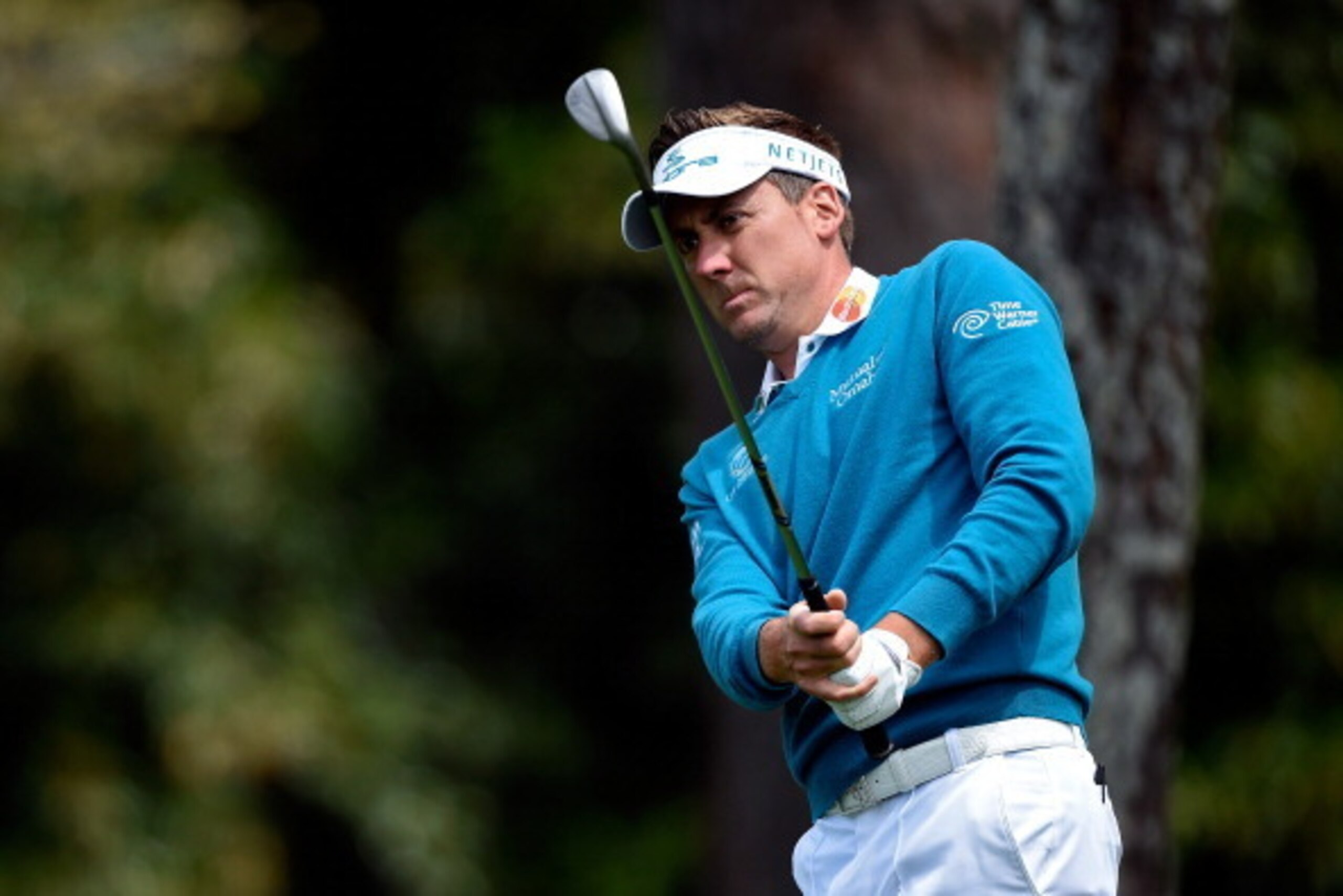 AUGUSTA, GA - APRIL 08:  Ian Poulter of England watches a shot during a practice round prior to the start of the 2014 Masters Tournament at Augusta National Golf Club on April 8, 2014 in Augusta, Georgia.  (Photo by Harry How/Getty Images)