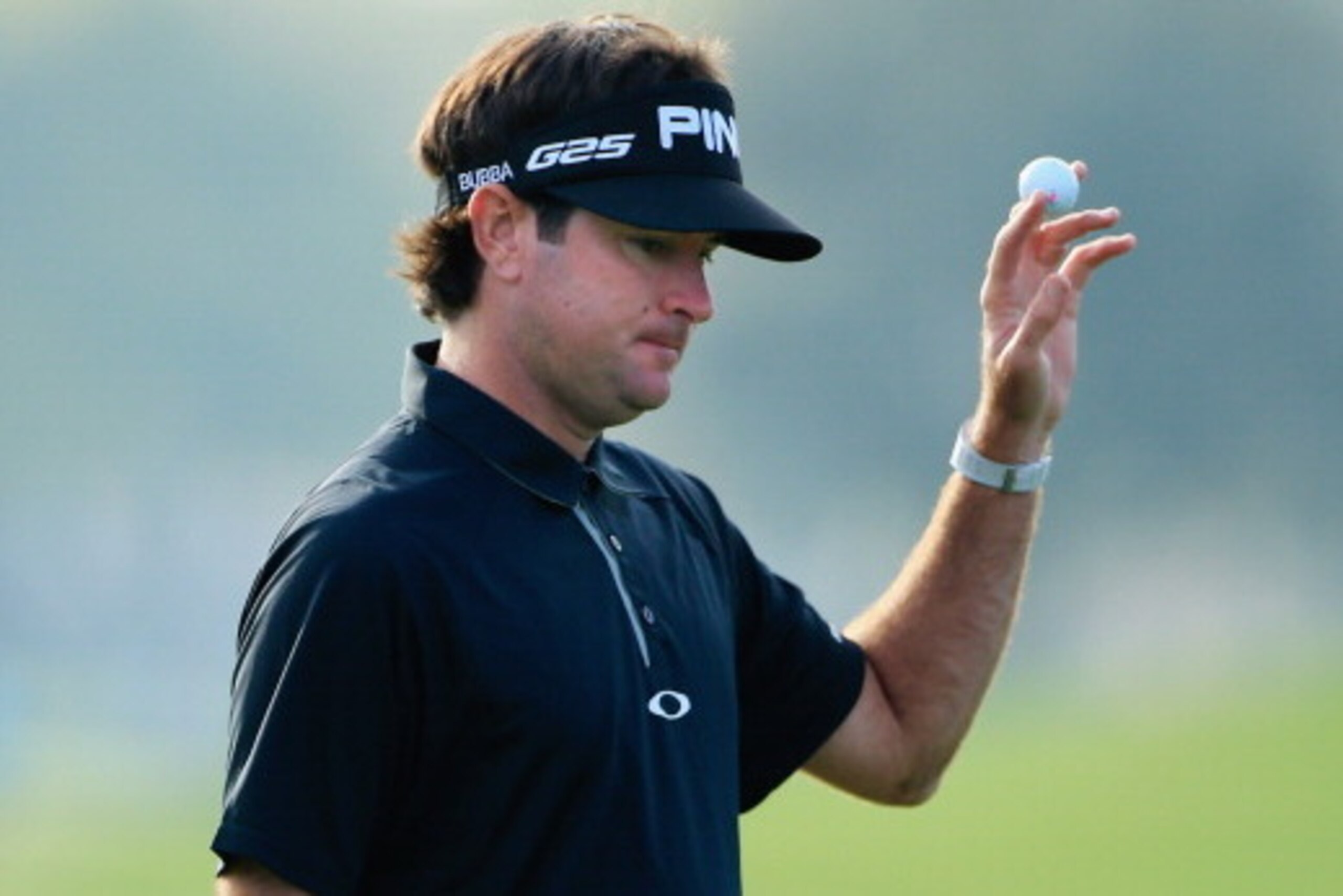 ORLANDO, FL - MARCH 20:  Bubba Watson of the United States waves after making a putt for par on the 12th hole during the first round of the Arnold Palmer Invitational presented by MasterCard at the Bay Hill Club and Lodge on March 20, 2014 in Orlando, Flo