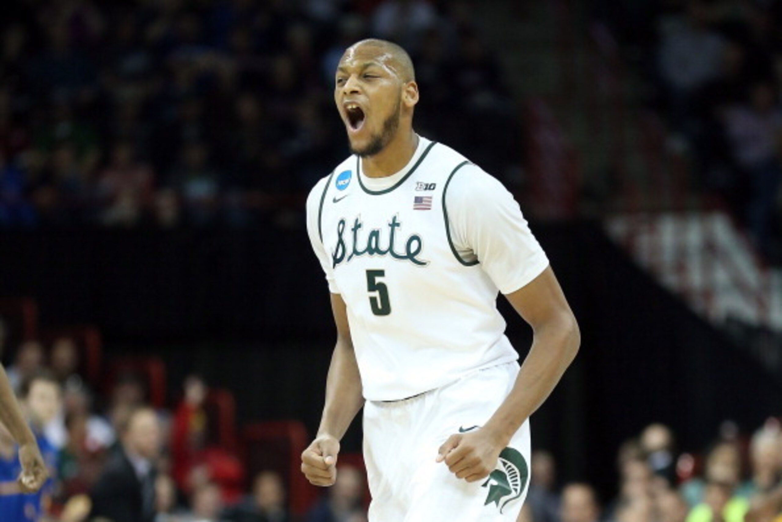 SPOKANE, WA - MARCH 20:  Adreian Payne #5 of the Michigan State Spartans reacts during their game against the Delaware Fightin Blue Hens the second round of the 2014 NCAA Men's Basketball Tournament at Spokane Veterans Memorial Arena on March 20, 2014 in 