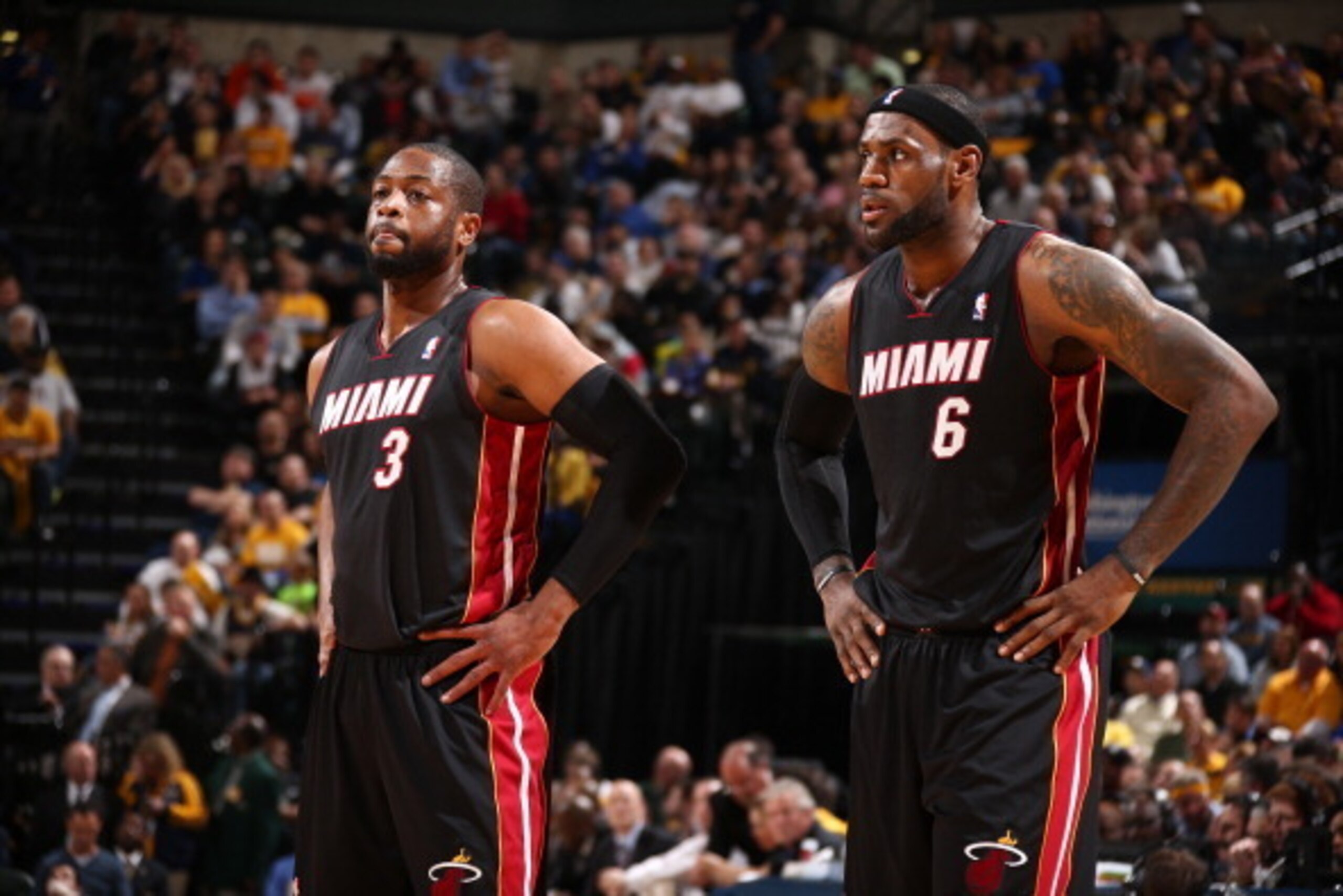 INDIANAPOLIS, IN - MARCH 26: Dwyane Wade #3 and LeBron James #6 of the Miami Heat stand on the court during a game against the Indiana Pacers on March 26, 2014 at Bankers Life Fieldhouse in Indianapolis, IN.  NOTE TO USER: User expressly acknowledges and 