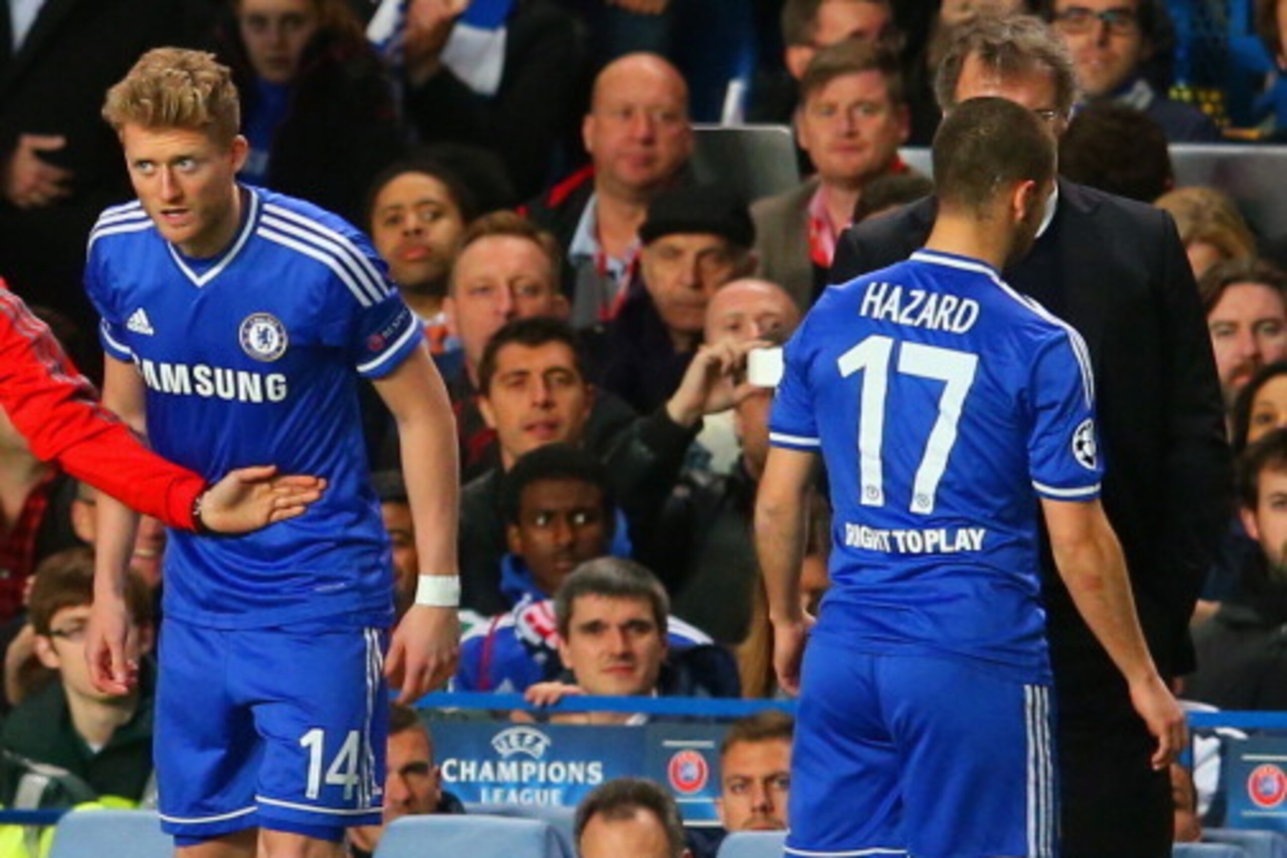 LONDON, ENGLAND - APRIL 08: Eden Hazard of Chelsea is replaced by Andre Schurrle of Chelsea  during the UEFA Champions League Quarter Final second leg match between Chelsea and Paris Saint-Germain FC at Stamford Bridge on April 8, 2014 in London, England.
