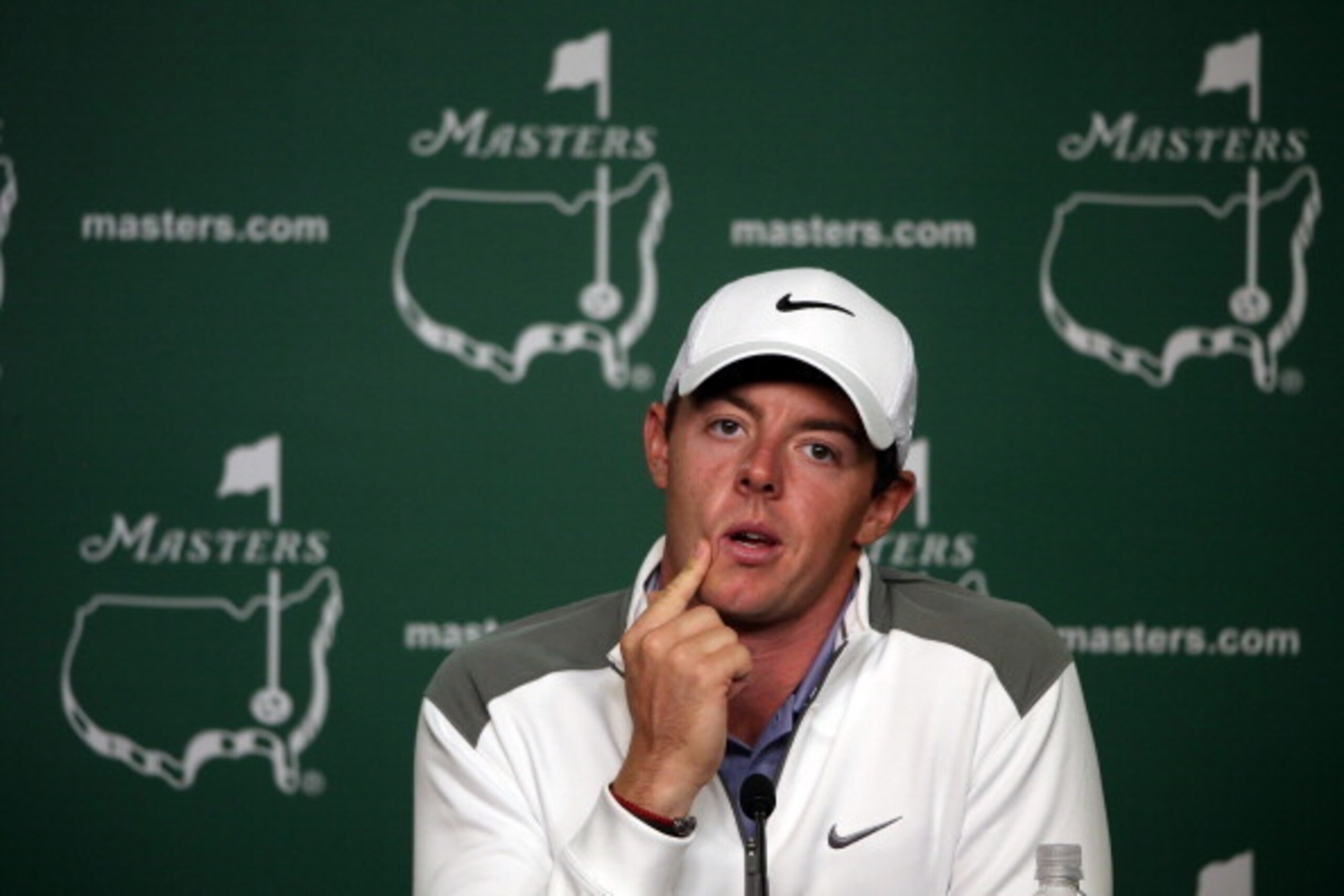 AUGUSTA, GA - APRIL 08:  Rory McIlroy of Northern Ireland speaks with the media during a practice round prior to the start of the 2014 Masters Tournament at Augusta National Golf Club on April 8, 2014 in Augusta, Georgia.  (Photo by Andrew Redington/Getty