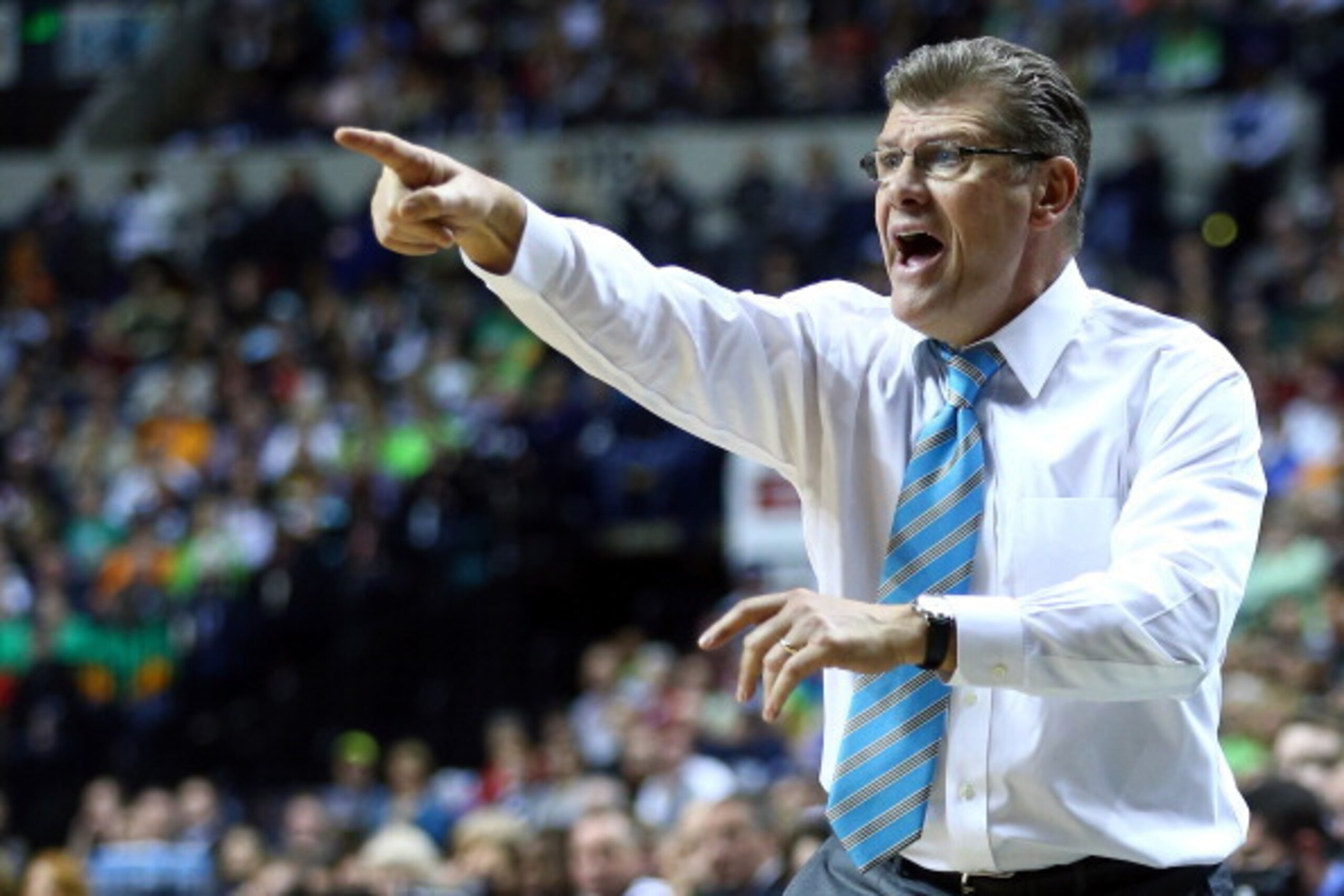 NASHVILLE, TN - APRIL 08:  Head coach Geno Auriemma of the Connecticut Huskies shouts to the players against the Notre Dame Fighting Irish in the first half during the NCAA Women's Final Four Championship at Bridgestone Arena on April 8, 2014 in Nashville