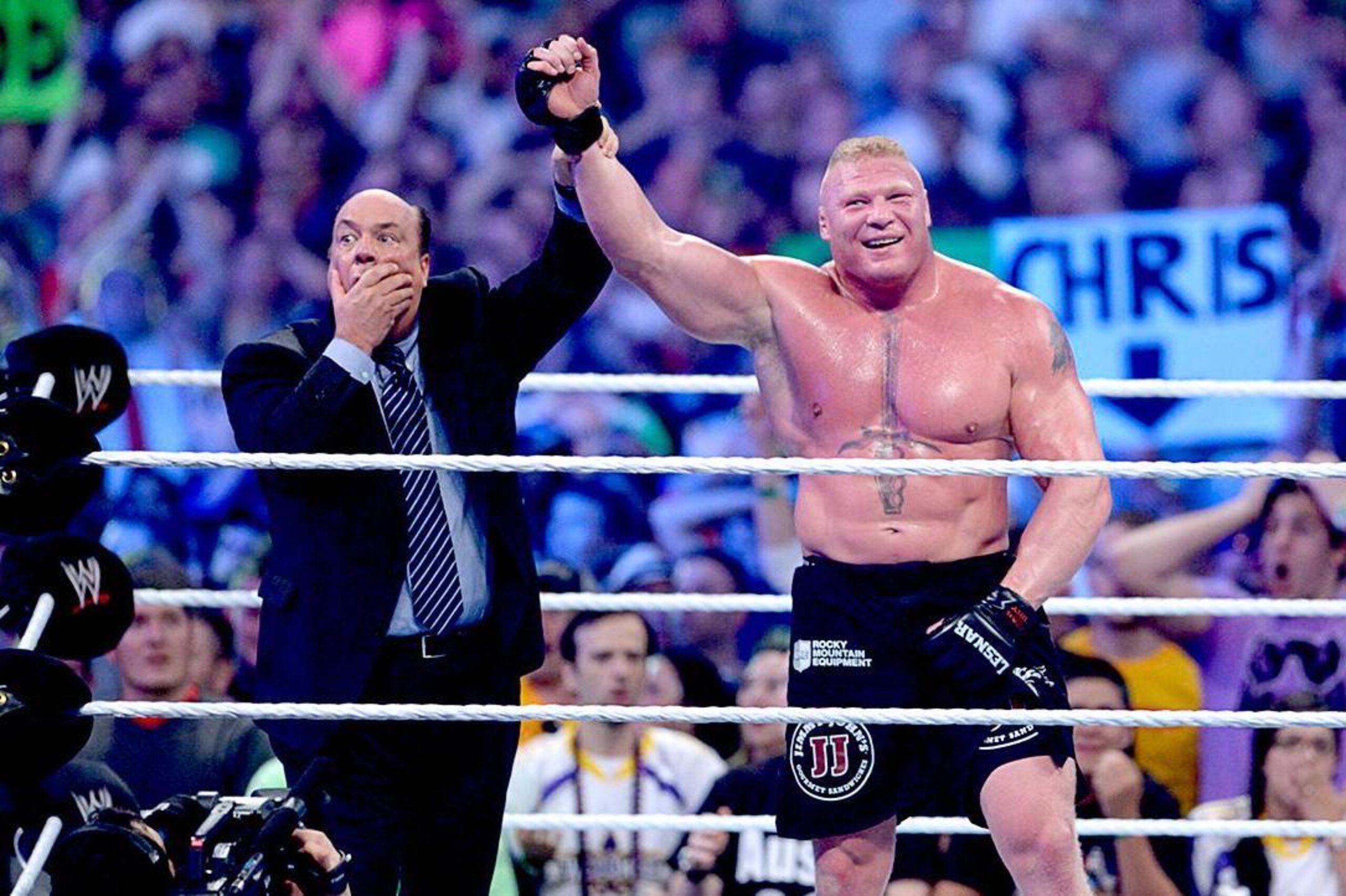 Brock celebrates after beating Undertaker