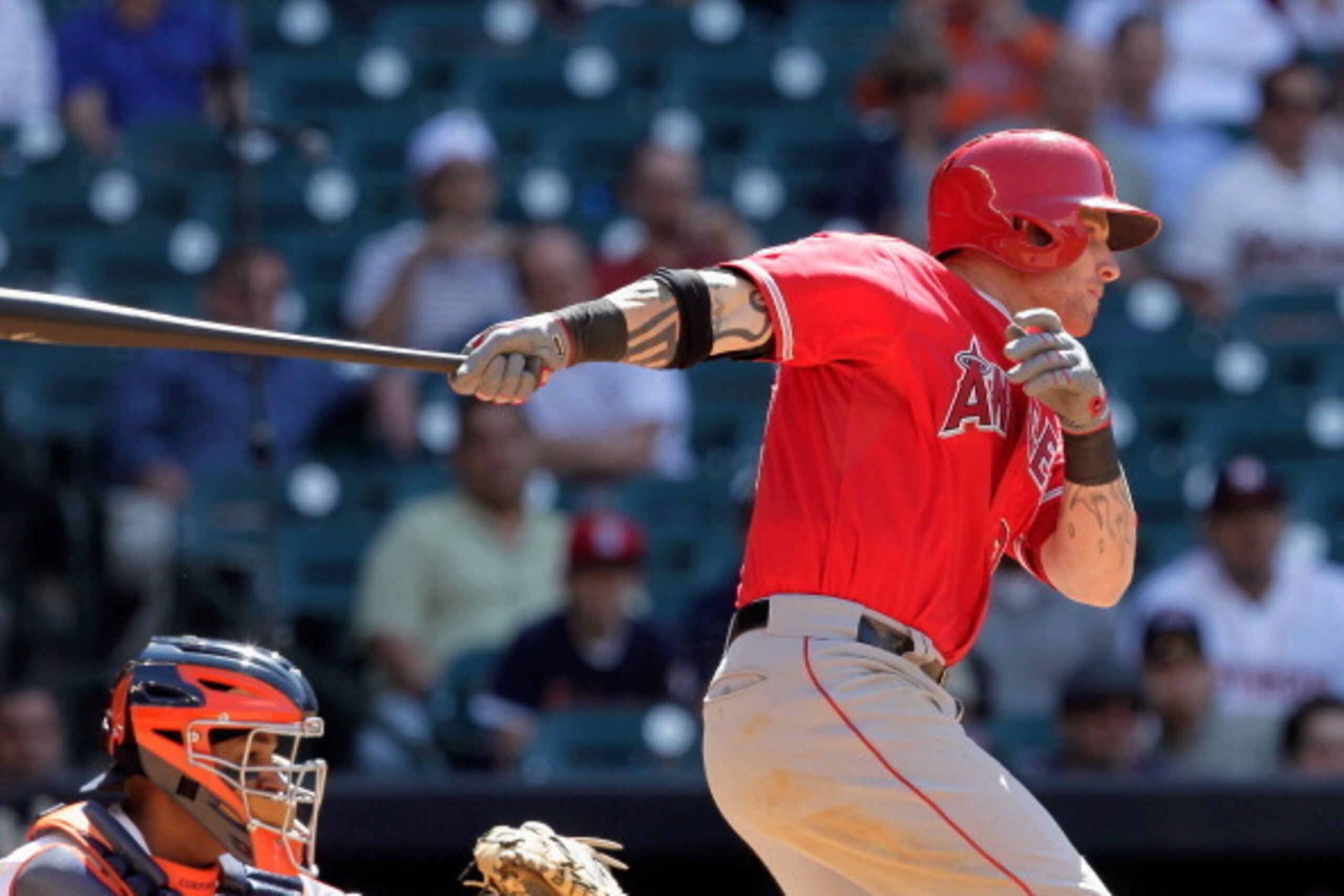 HOUSTON, TX - APRIL 07:  Josh Hamilton #32 of the Los Angeles Angels of Anaheim singles in the ninth inning against the Houston Astros at Minute Maid Park on April 7, 2014 in Houston, Texas.  (Photo by Bob Levey/Getty Images)