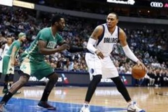 Mar 17, 2014; Dallas, TX, USA; Dallas Mavericks forward Shawn Marion (0) dribbles as Boston Celtics forward Jeff Green (8) defends during the game at American Airlines Center. Dallas won 94-89. Mandatory Credit: Kevin Jairaj-USA TODAY Sports