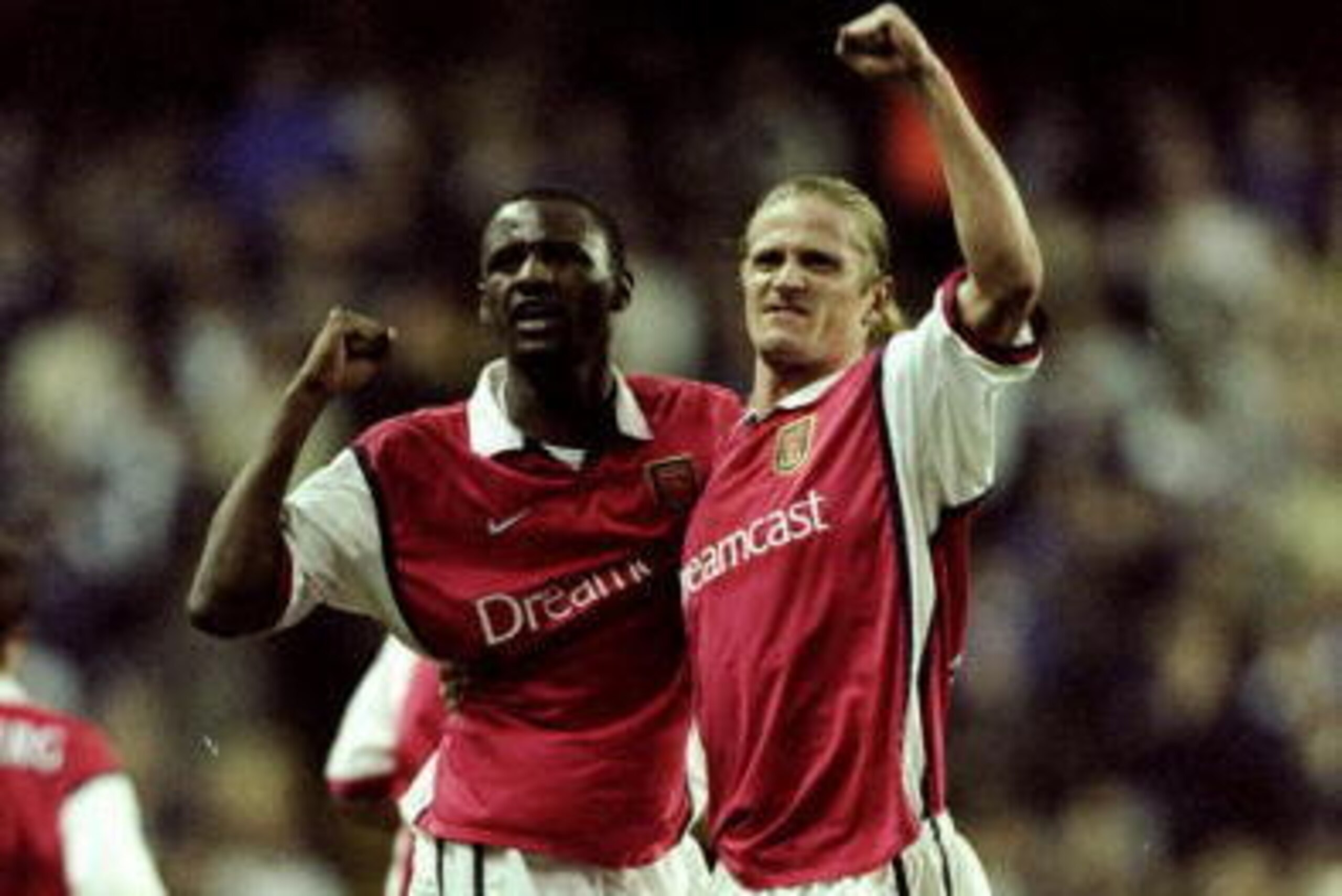 7 Nov 1999: Arsenal's midfield men Patrick Vieira and Emmanuel Petit celebrate during the FA Carling Premiership match against Tottenham Hotspur at White Hart Lane in London. Spurs won 2-1. \ Mandatory Credit: Phil Cole /Allsport 7 Nov 1999: Arsenal's midfield men Patrick Vieira and Emmanuel Petit celebrate during the FA Carling Premiership match against Tottenham Hotspur at White Hart Lane in London. Spurs won 2-1. \ Mandatory Credit: Phil Cole /Allsport